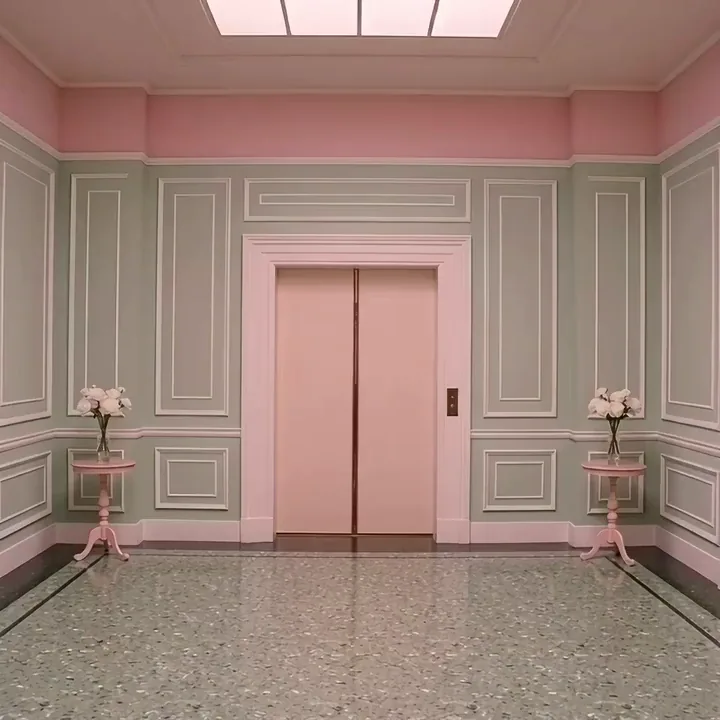 Seedance 2.0 video of a bellhop carrying a stack of white boxes out of a pink lift into a mint green lobby
