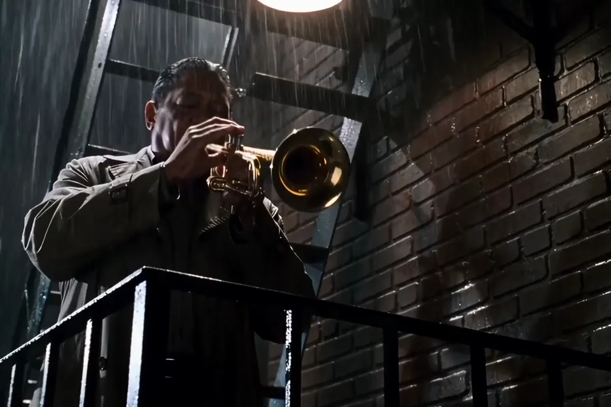 Hailuo AI video of a jazz trumpeter playing one long note on a rainy fire escape at night