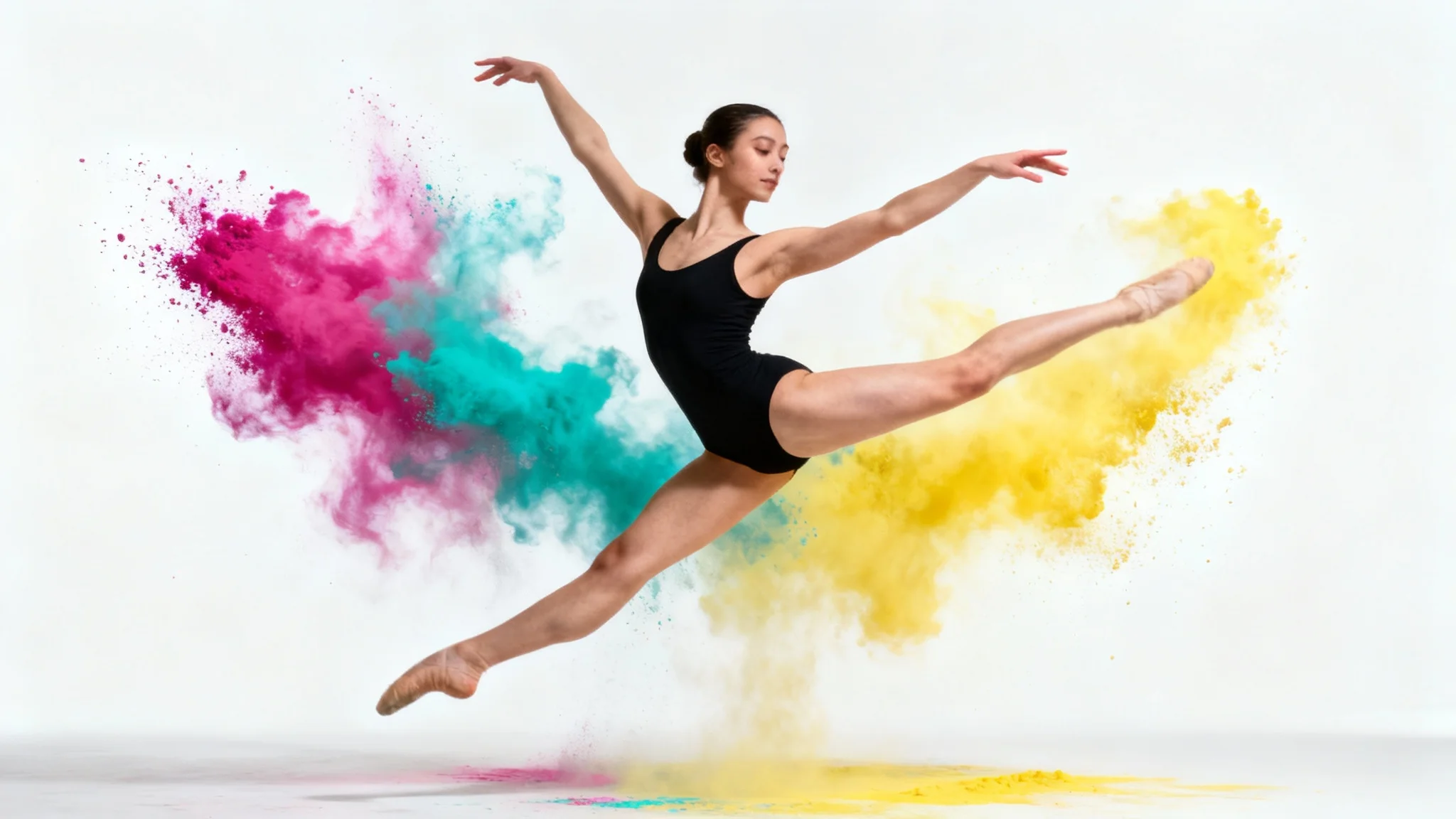 A female contemporary dancer in a black leotard is captured mid-movement against a plain white background, as a cloud of vibrant magenta, turquoise, and yellow powder explodes around her.