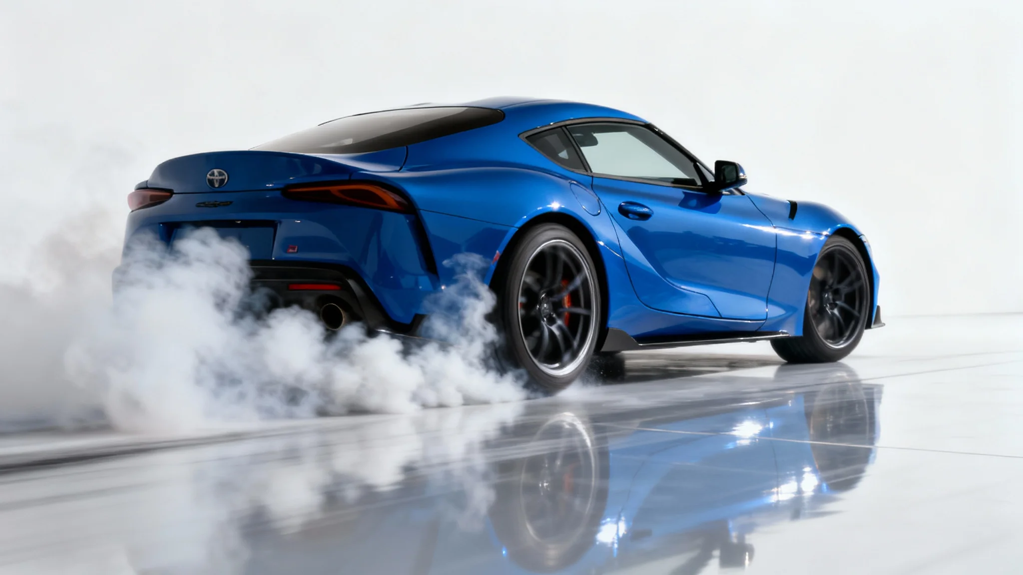 A photorealistic mockup of a professional car video edit, showing a blue sports car drifting at high speed with smoke from its tires, isolated on a pure white background.