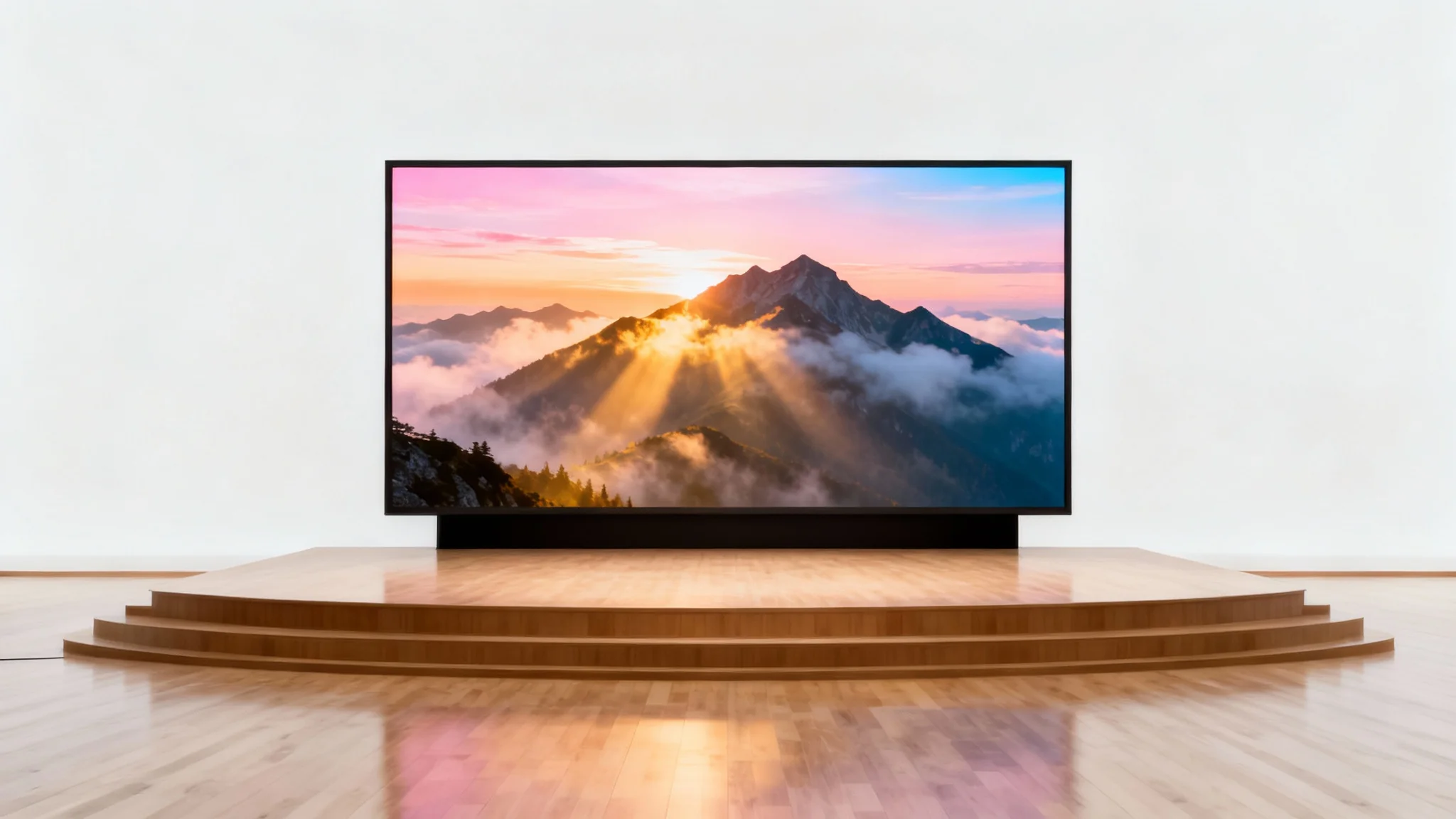 A mockup of a large screen on a stage displaying a beautiful sermon background of a mountain sunrise, set against a plain white background.