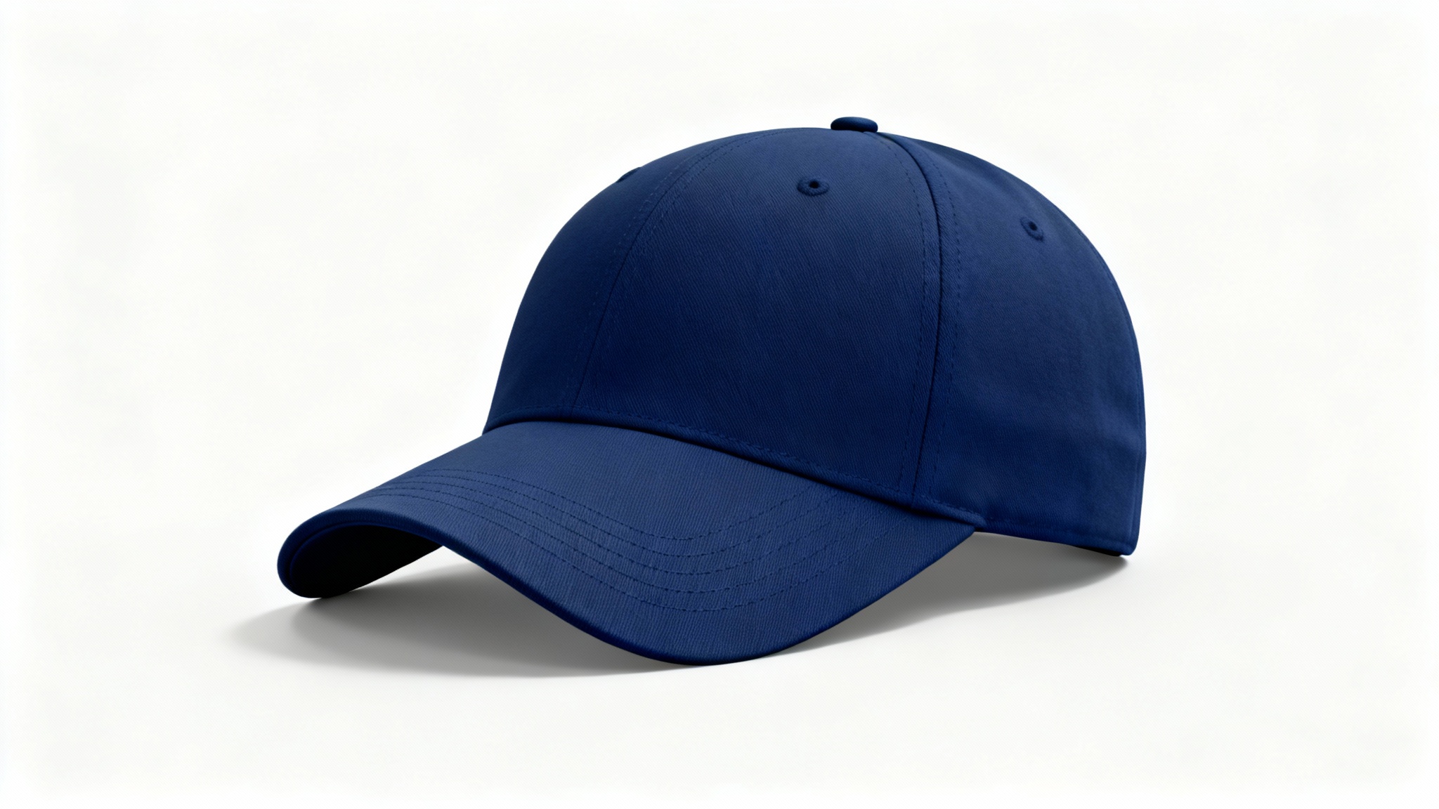 A high-quality mockup image of a blank navy blue baseball cap shot in a professional studio setting against a clean white background.