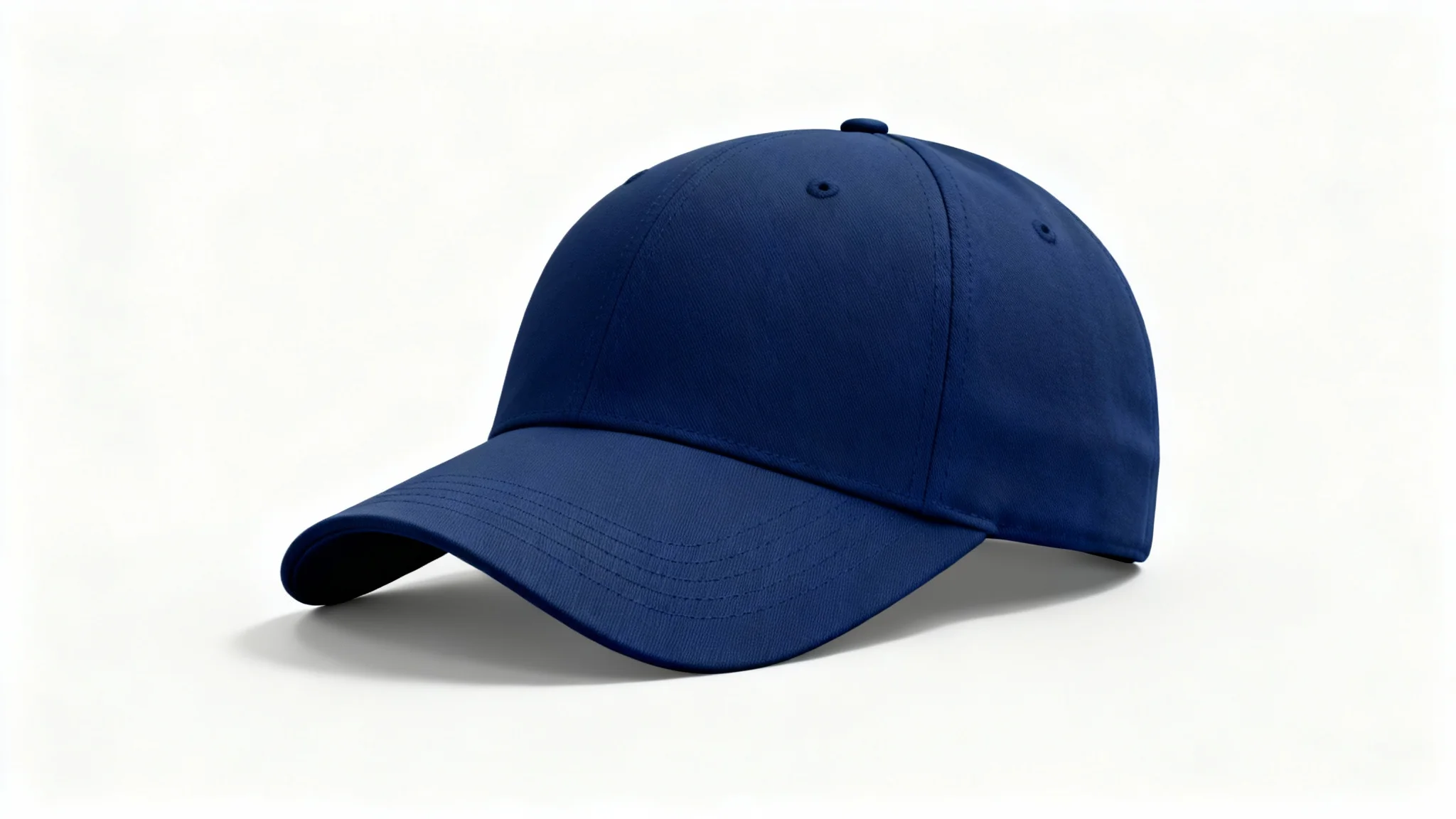 A high-quality mockup image of a blank navy blue baseball cap shot in a professional studio setting against a clean white background.
