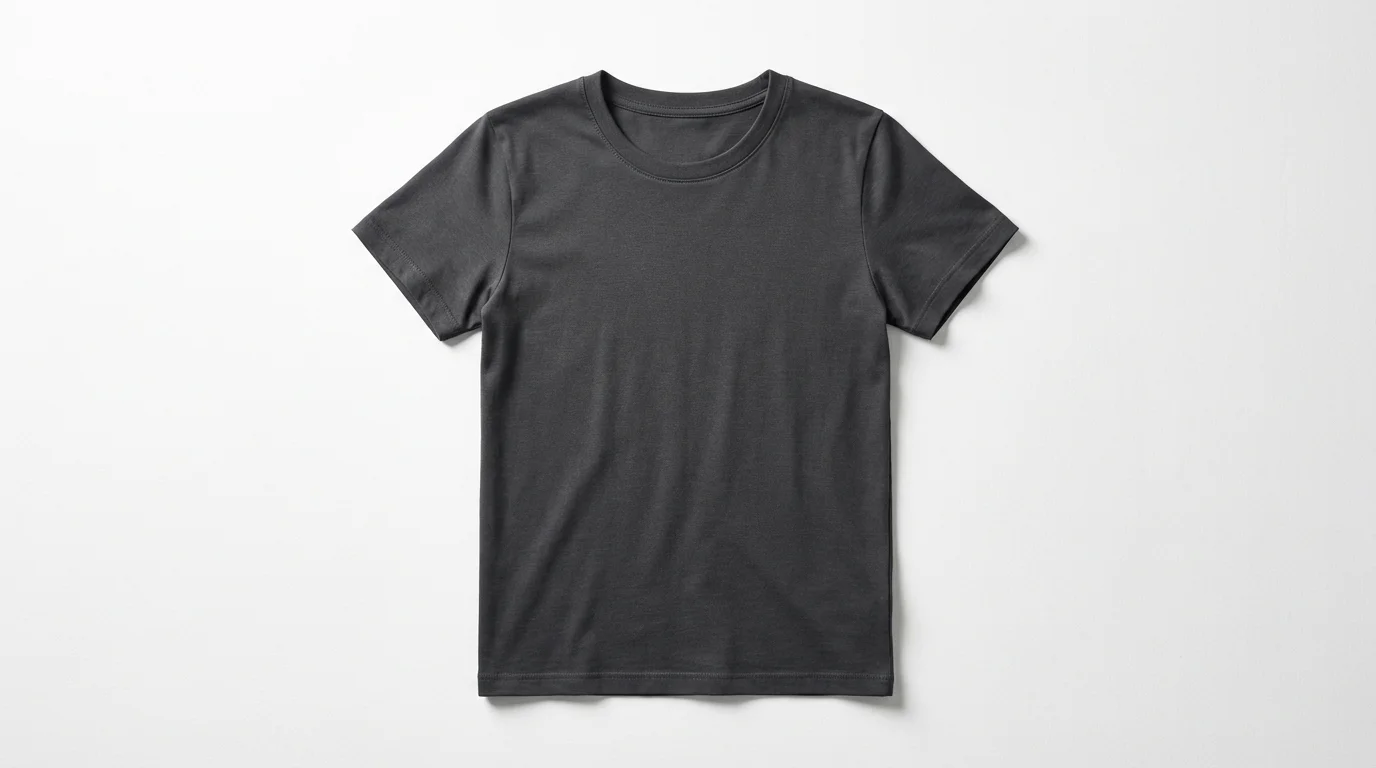 A professional flat lay photograph of a plain charcoal gray t-shirt, neatly arranged on a solid white background, showcasing its texture and quality.