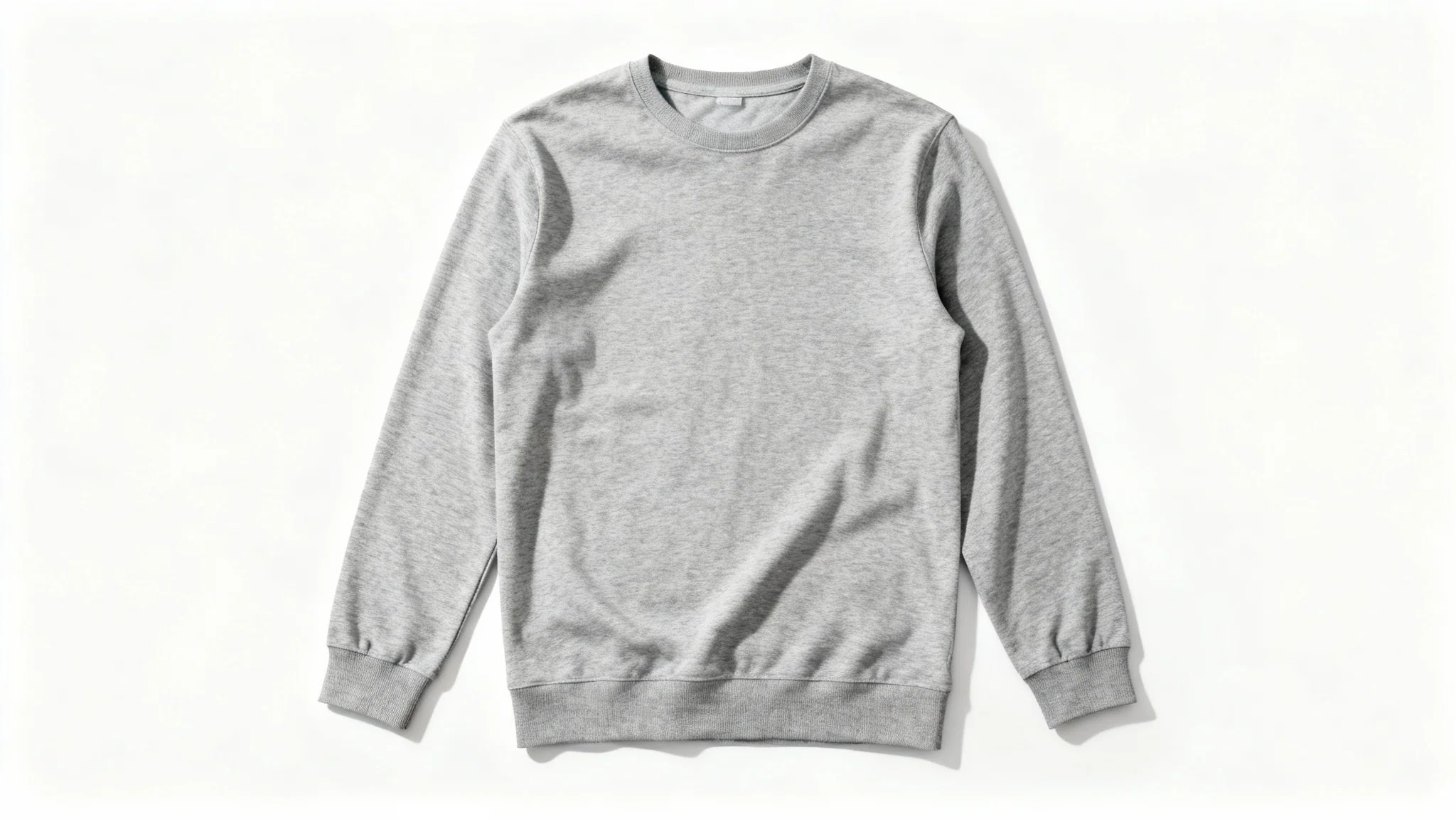 A photorealistic mockup of a heather grey long sleeve shirt laid flat on a clean white background, viewed from directly above.