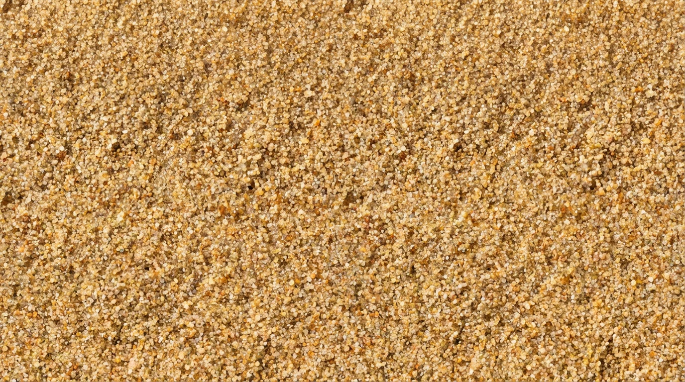 A photorealistic, seamless, top-down texture of fine golden sand, with intricate details of individual grains visible under bright light.