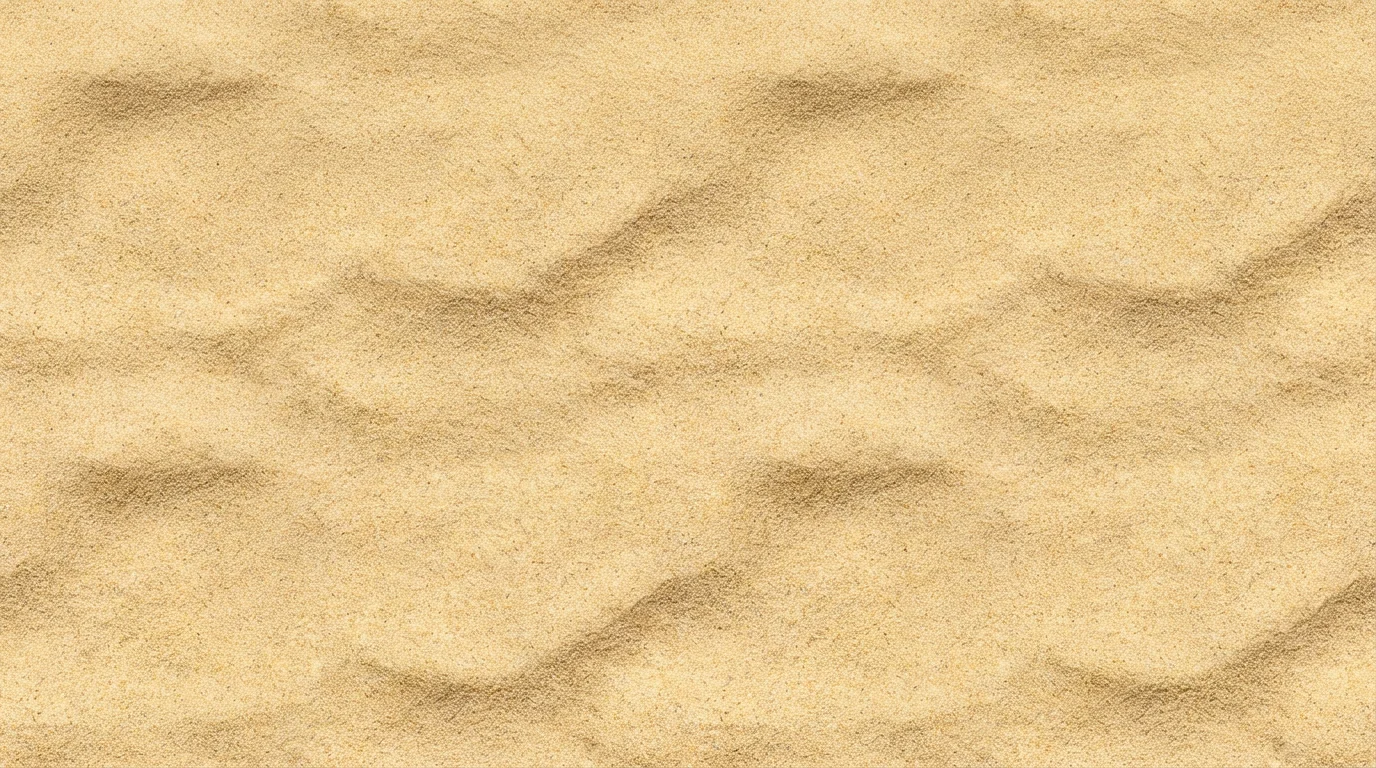 A detailed, top-down view of a seamless, tileable texture of fine golden sand with gentle, windswept ripples.