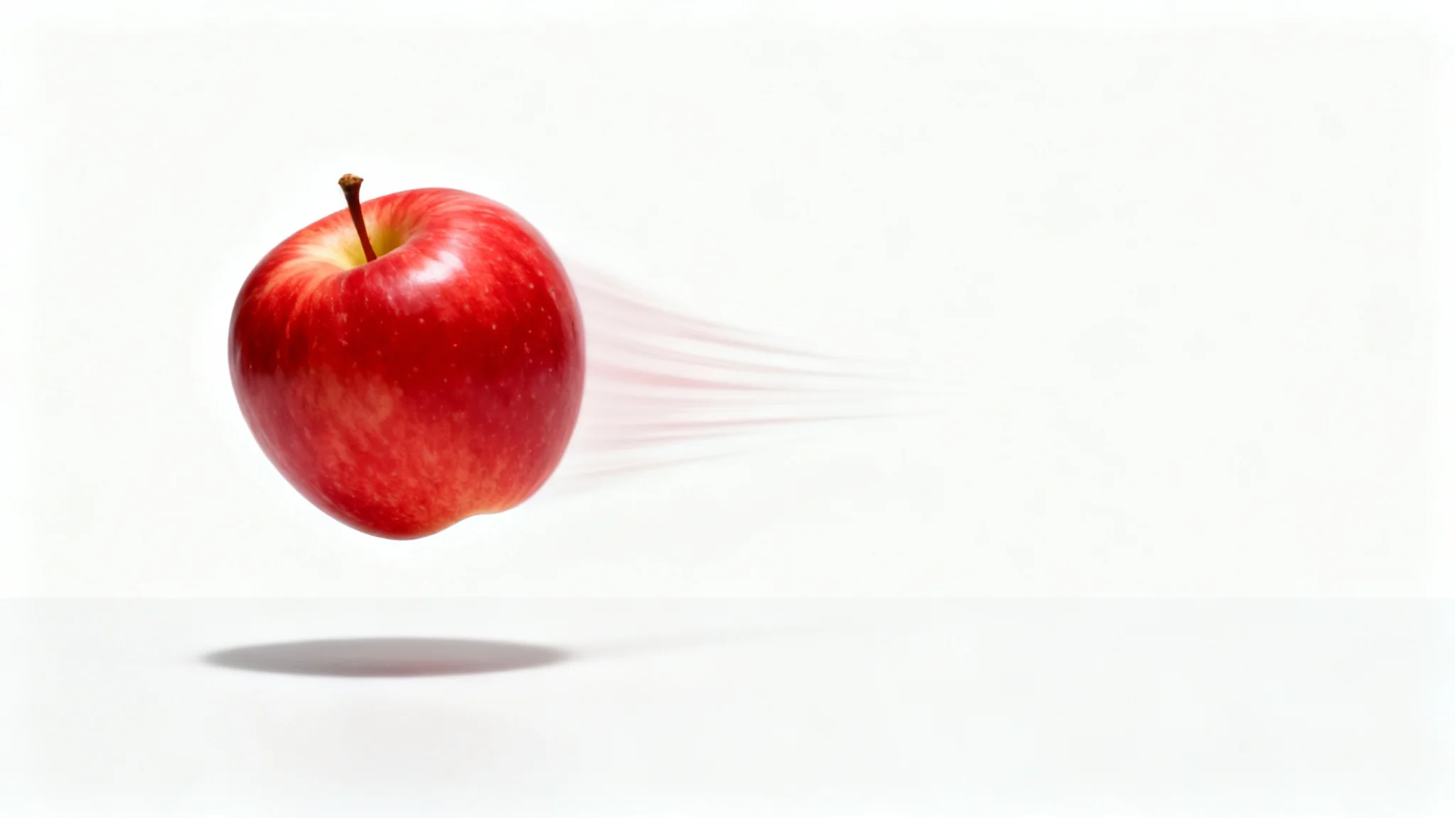 A conceptual, photorealistic image showing a single red apple in mid-air, with a motion blur effect indicating it is moving from left to right against a clean white background.