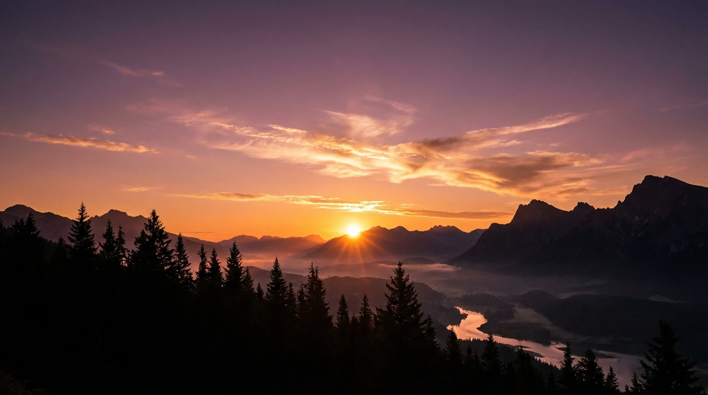 A breathtaking, high-resolution photo of a vibrant sunrise over a mountain range, with the sun's rays illuminating the colorful clouds.