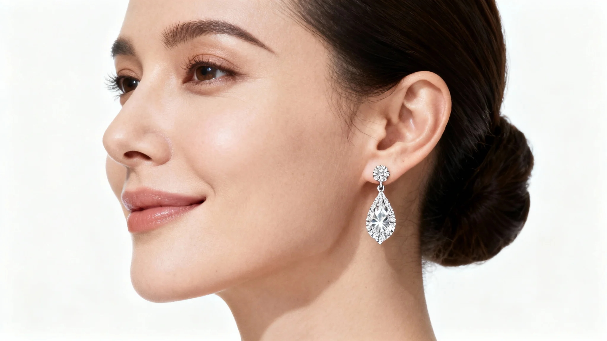 A close-up, photorealistic image of a woman's ear adorned with a beautiful, sparkling diamond drop earring, demonstrating a virtual try-on against a clean white background.
