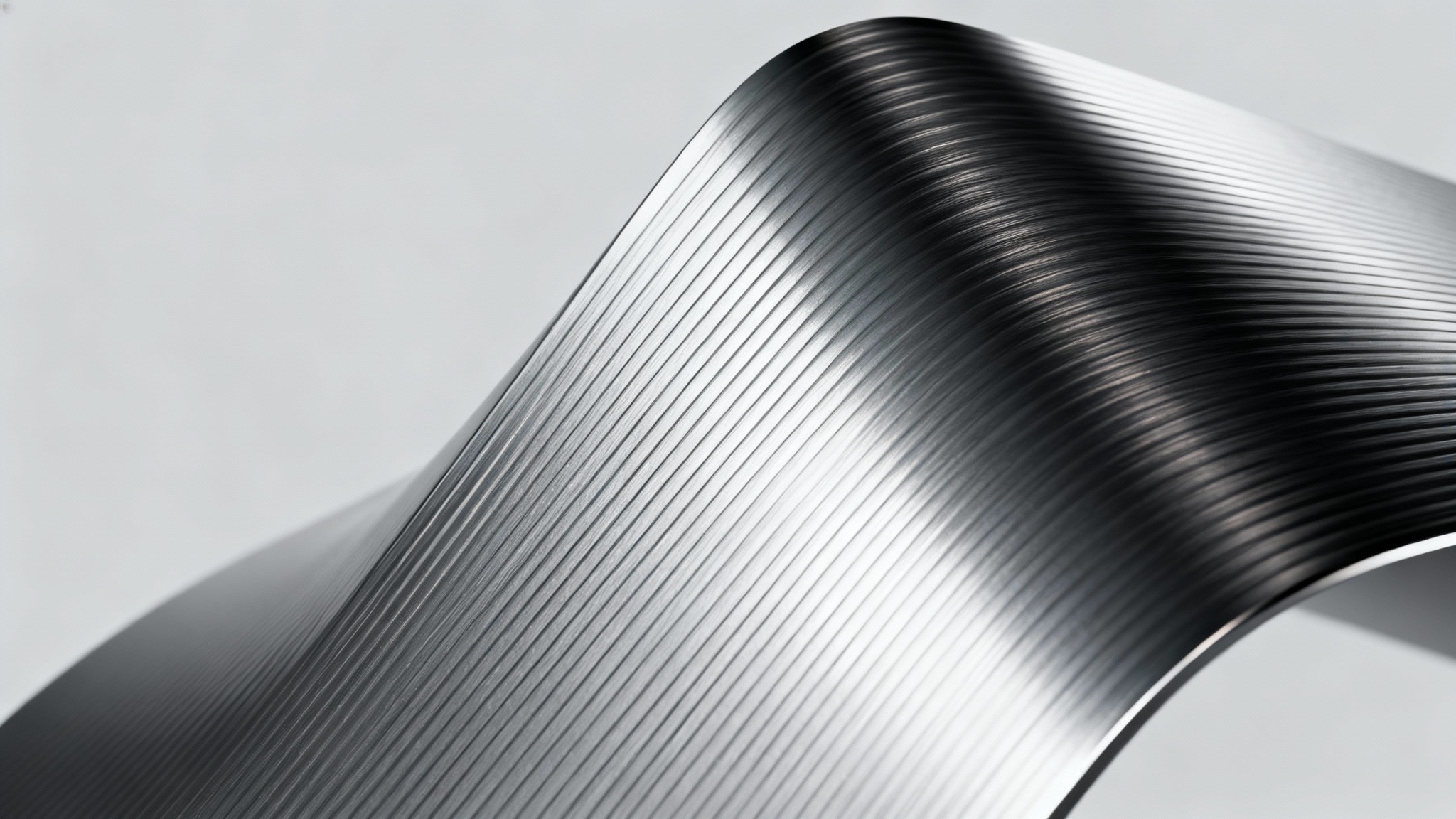 An eye-catching hero image showcasing a hyper-realistic brushed aluminum texture on a sleek, modern object, with dramatic lighting emphasizing the metallic sheen and fine grain lines against a clean background.