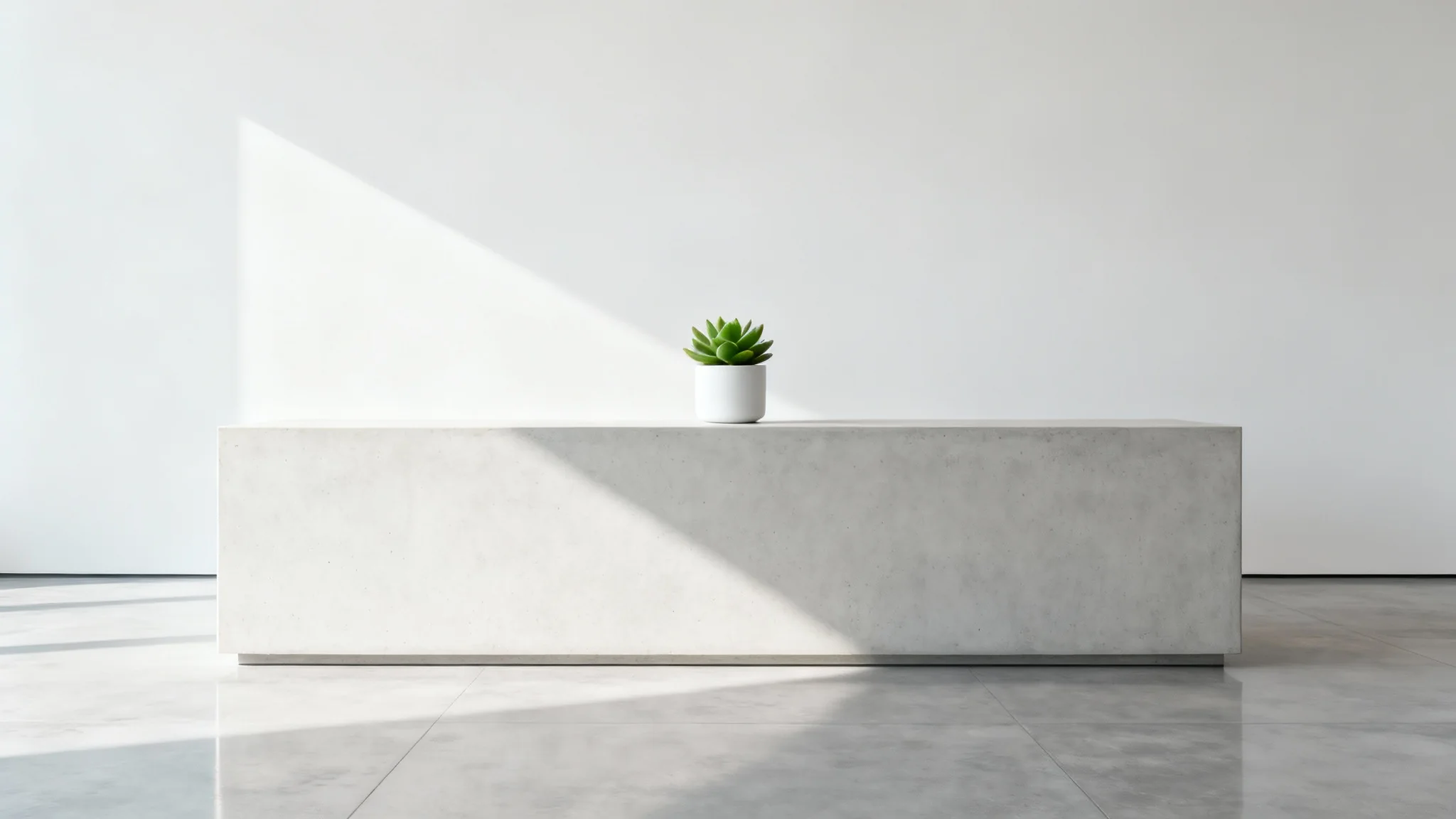 A photorealistic image of a minimalist reception desk made of light concrete, situated in a bright, modern lobby with a white wall and polished concrete floors.
