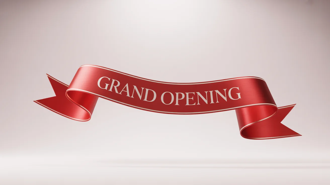 A realistic mockup of a celebratory red ribbon banner with the words 'Grand Opening' in gold text, floating against a white background.