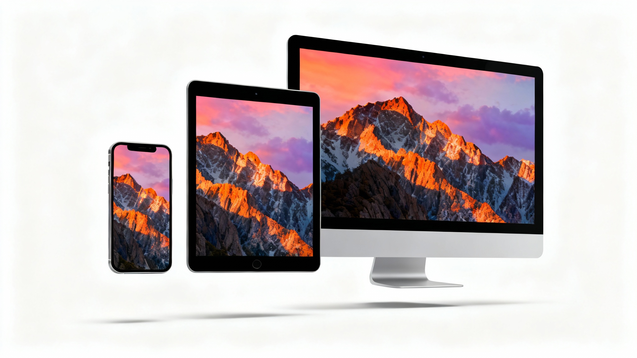 A smartphone, tablet, and desktop monitor lined up, each showing the same mountain sunrise wallpaper perfectly resized for its screen, against a white background.