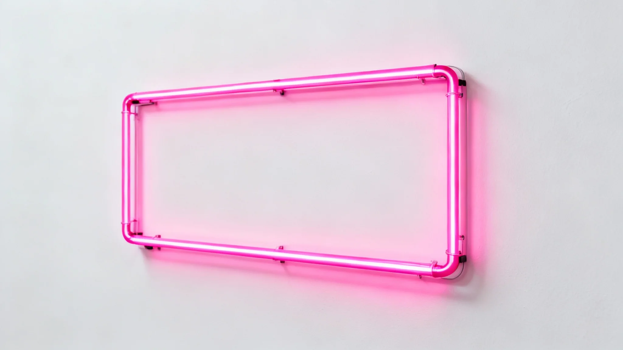A minimalist product shot of a rectangular neon frame in a vibrant hot pink color, glowing brightly against a plain white background.