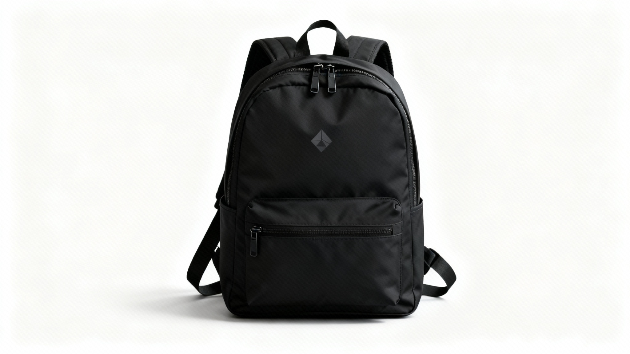 A professional product photograph of a modern black backpack, perfectly isolated against a pure white background, showcasing its sleek design and textures.