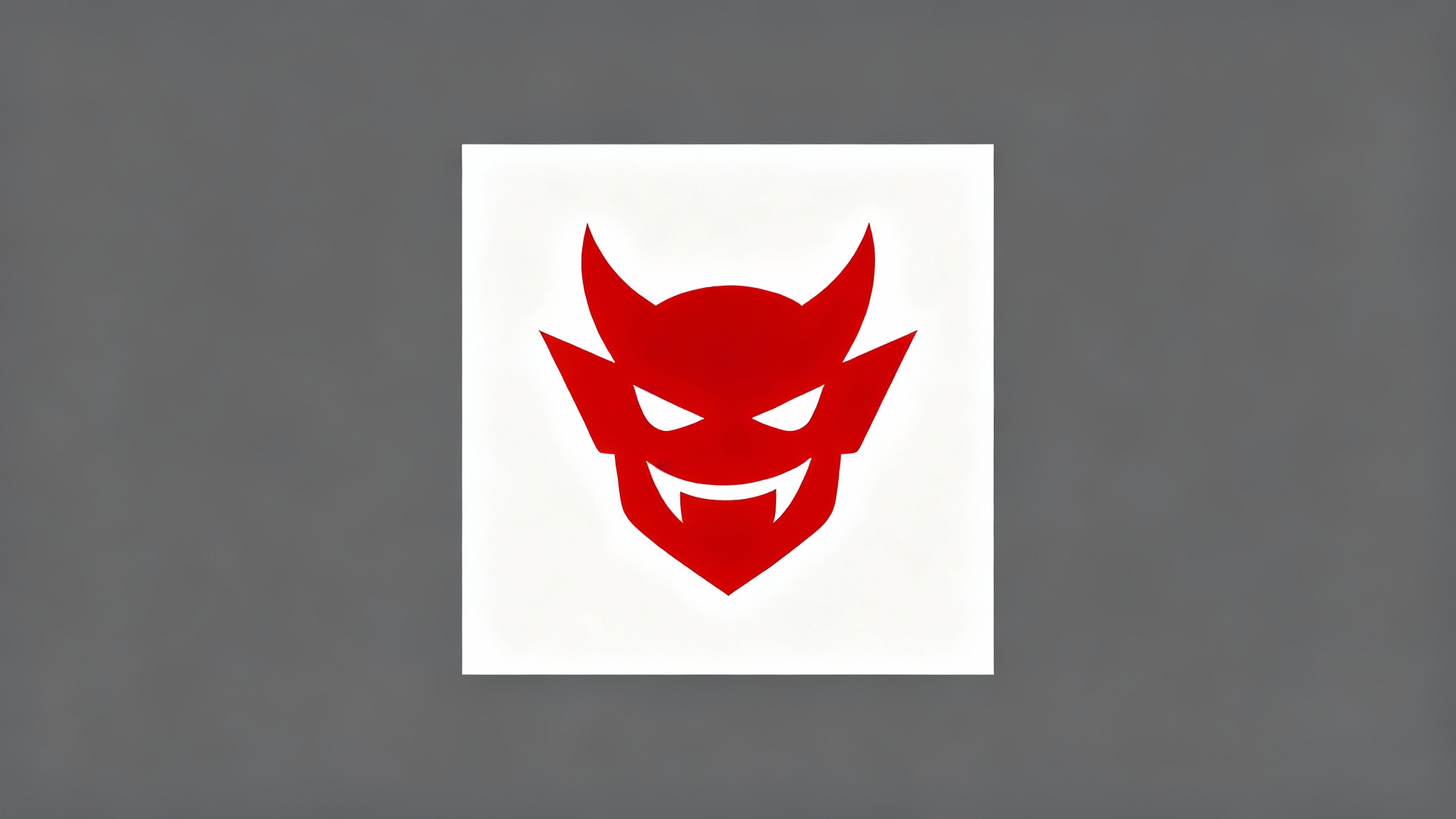 A modern vector logo of a mischievous red devil's head, designed in a bold, minimalist style using a vibrant red color, centered on a crisp white background.