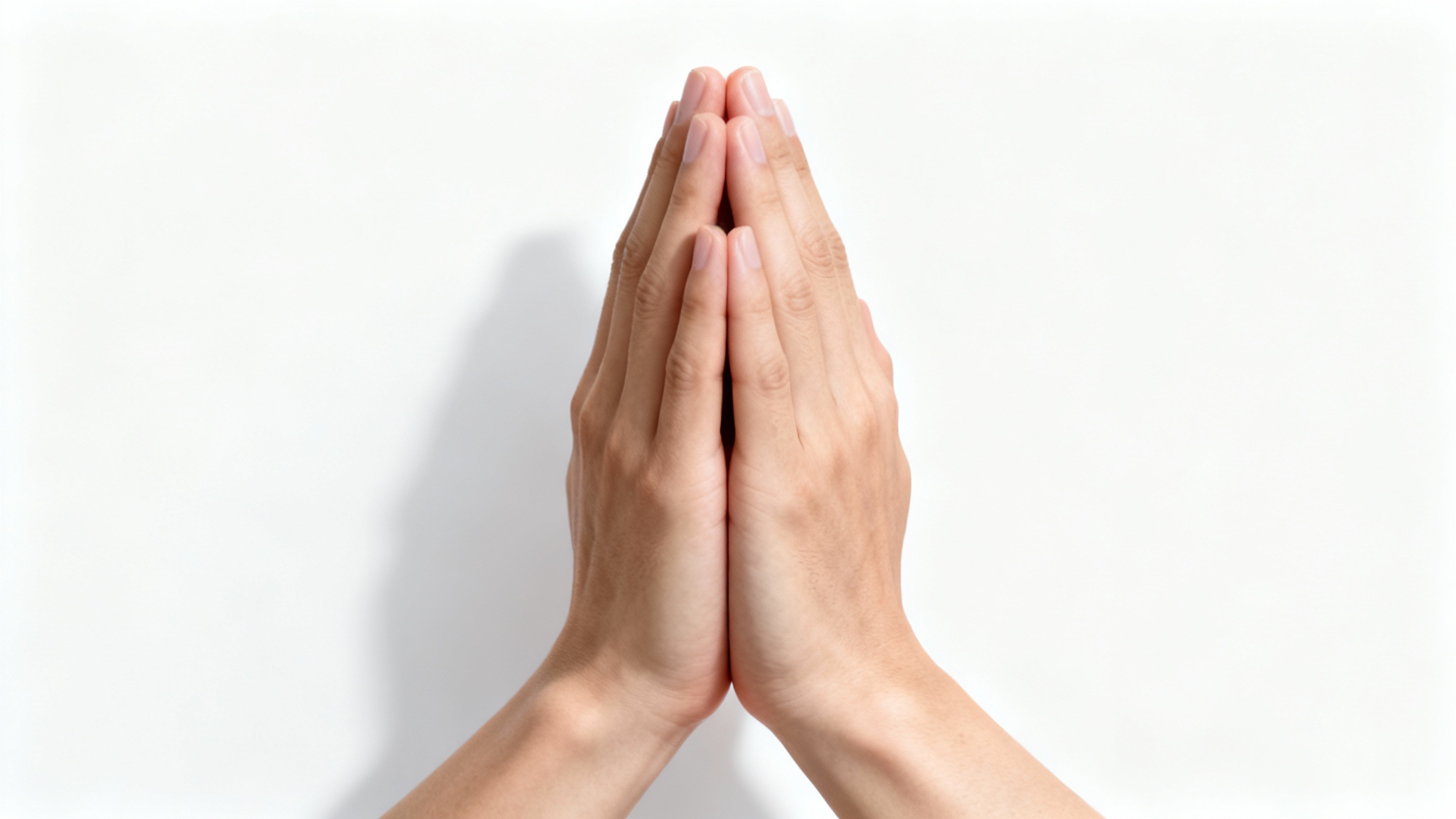 A photorealistic close-up of a pair of hands clasped together in prayer against a plain white background, symbolizing faith and serenity.
