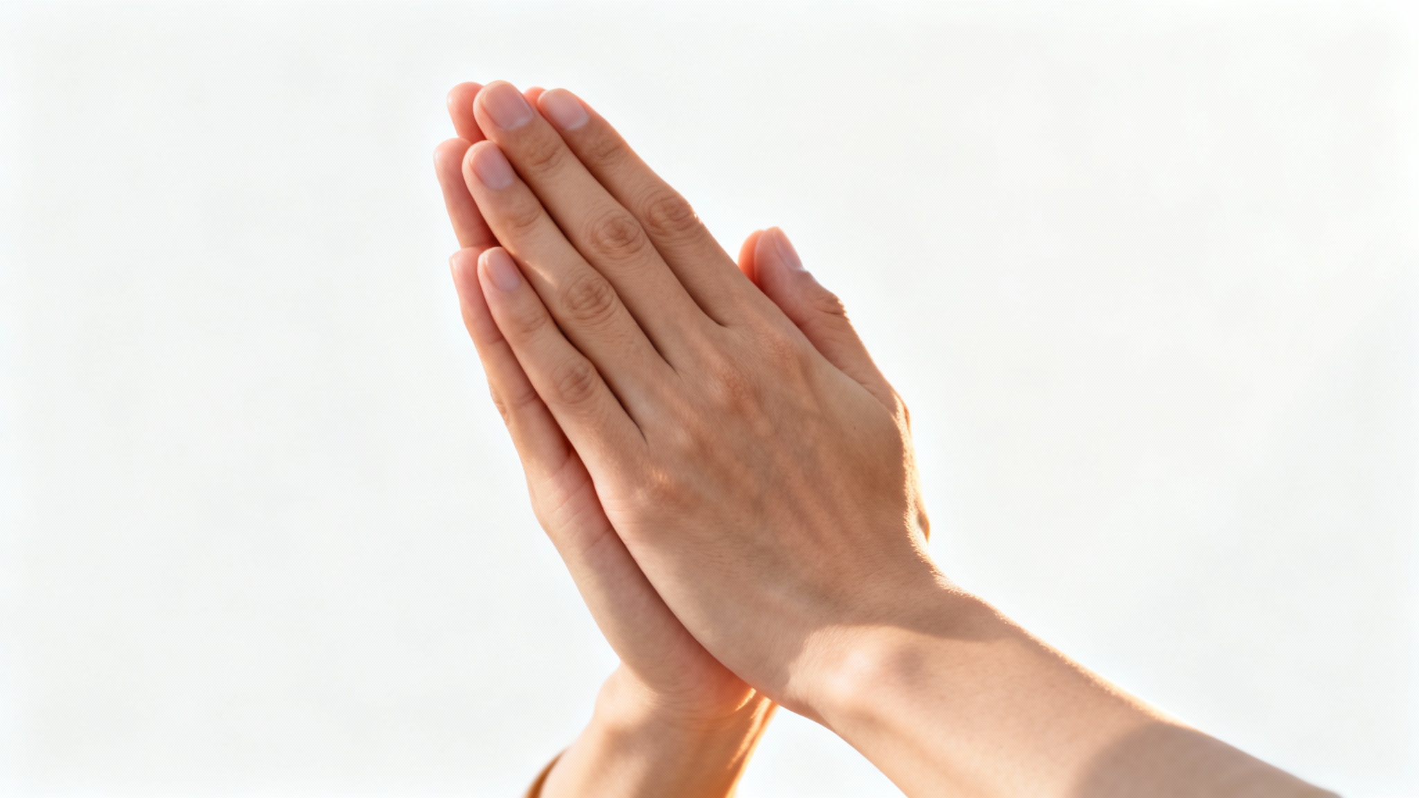 A photorealistic close-up of a pair of hands clasped in prayer against a stark white background, evoking a sense of peace and contemplation.