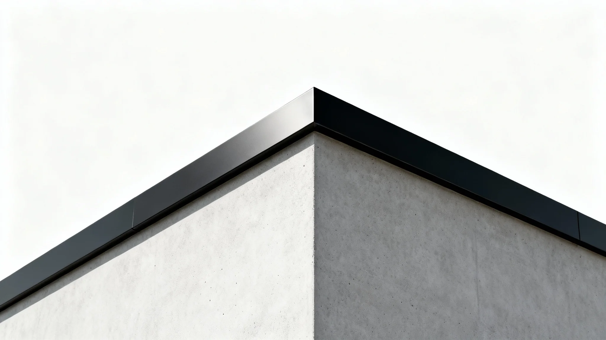 A detailed architectural mockup of a modern parapet wall with a light-gray concrete base and a matte black metal coping, shown against a clean white background.