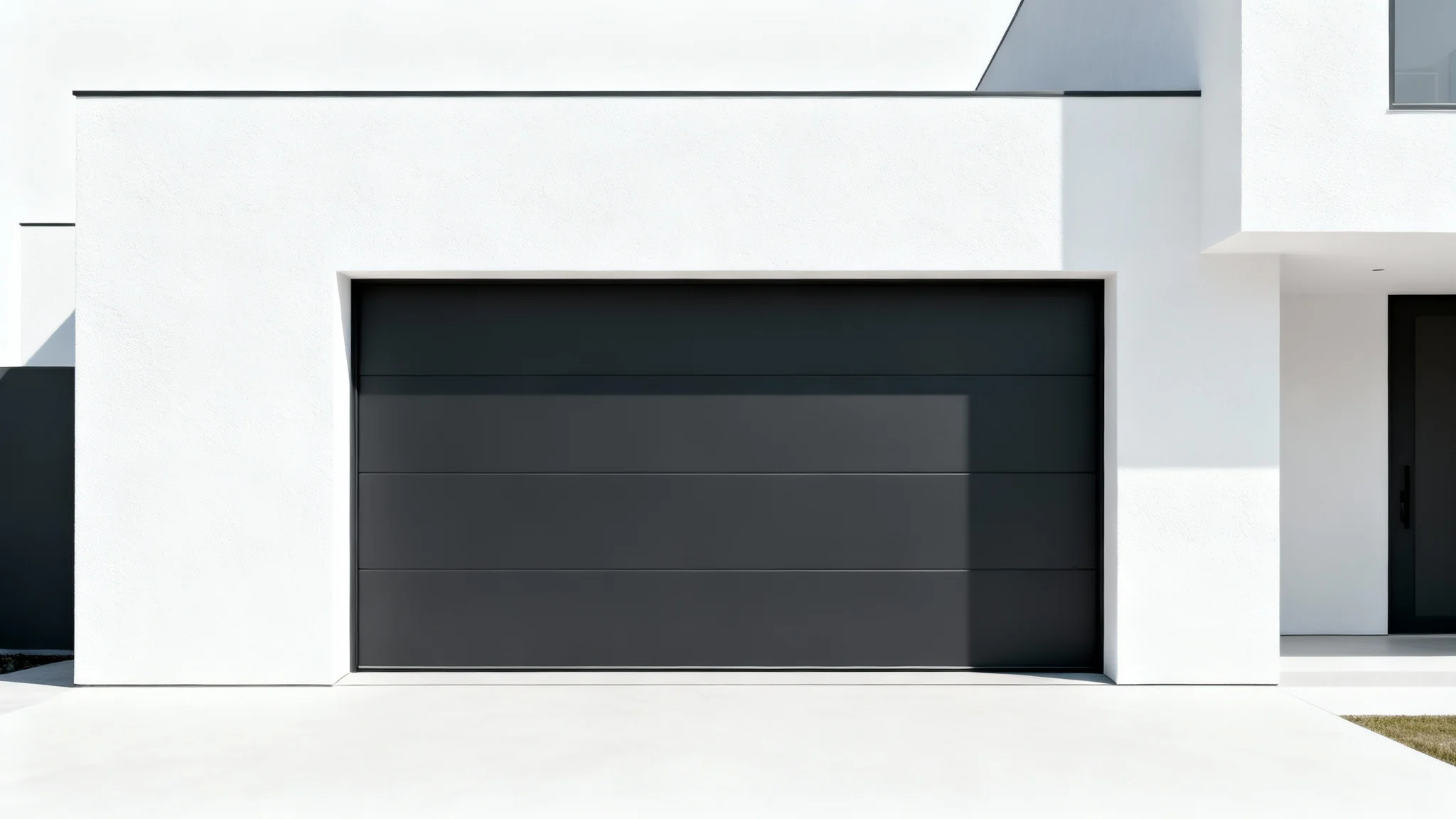 A photorealistic mockup of a modern, dark charcoal garage door with horizontal panels, set against a clean white background.