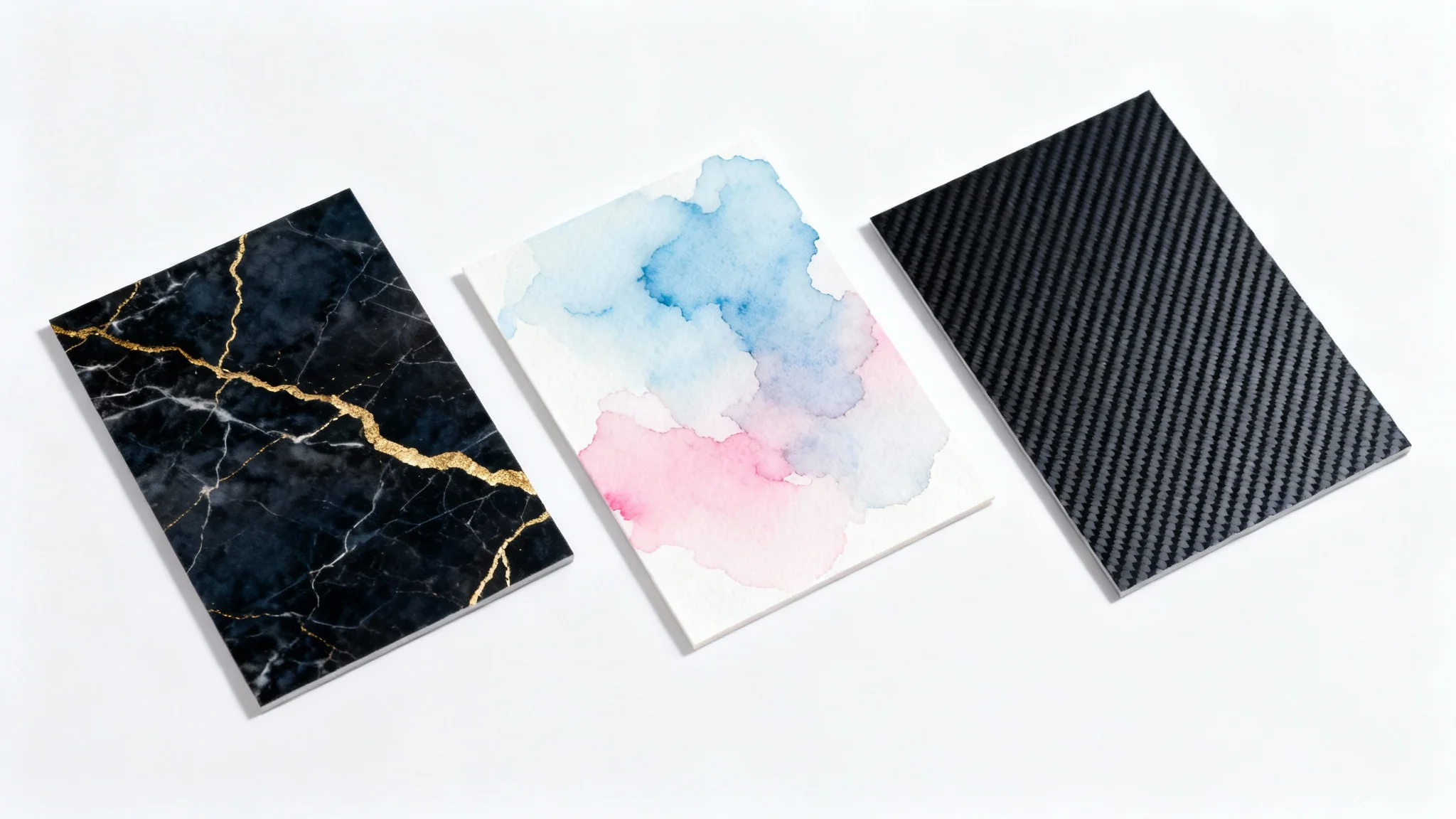 A collection of three rectangular logo background samples on a white surface, featuring dark marble with gold, a pastel watercolor wash, and a dark carbon fiber texture, representing professional branding options.