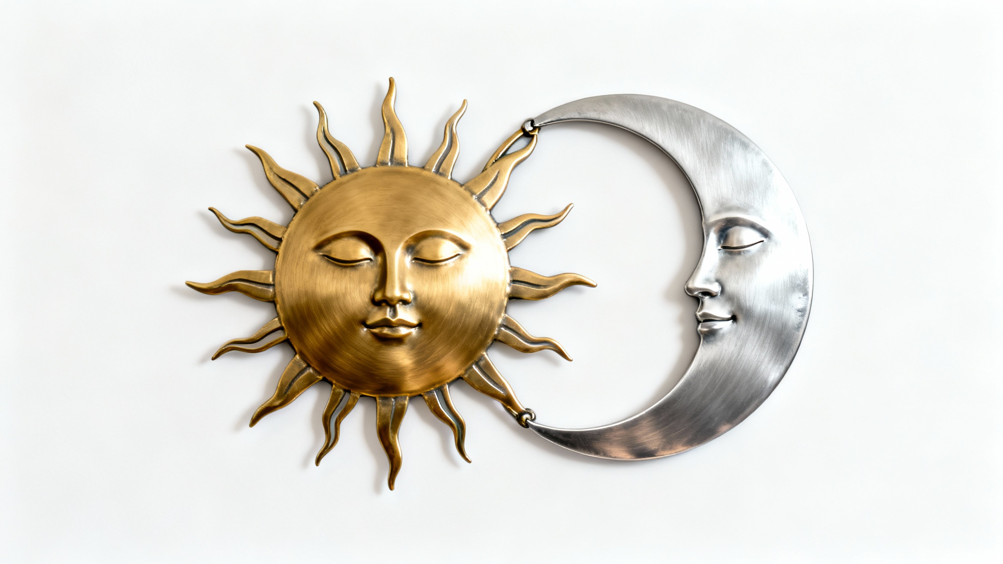 A minimalist metal wall art piece showing a brushed gold sun and a brushed silver crescent moon intertwined, presented on a clean white background.