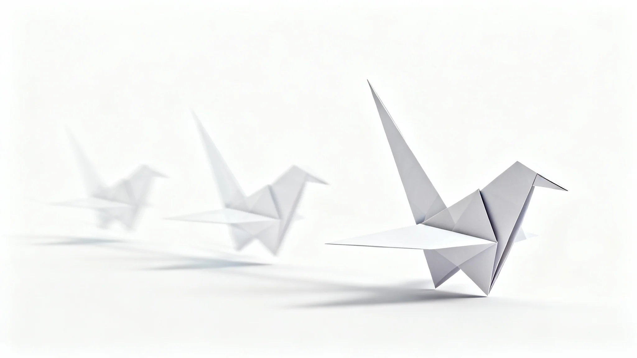 A mockup illustrating image animation, showing a stylized origami bird in motion against a white background, with a motion trail of transparent copies following it to indicate movement.