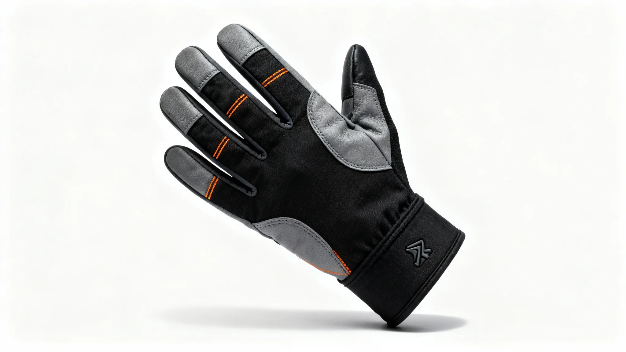 A single, high-performance black and grey glove with orange accents, professionally photographed against a plain white background to showcase its design and materials.