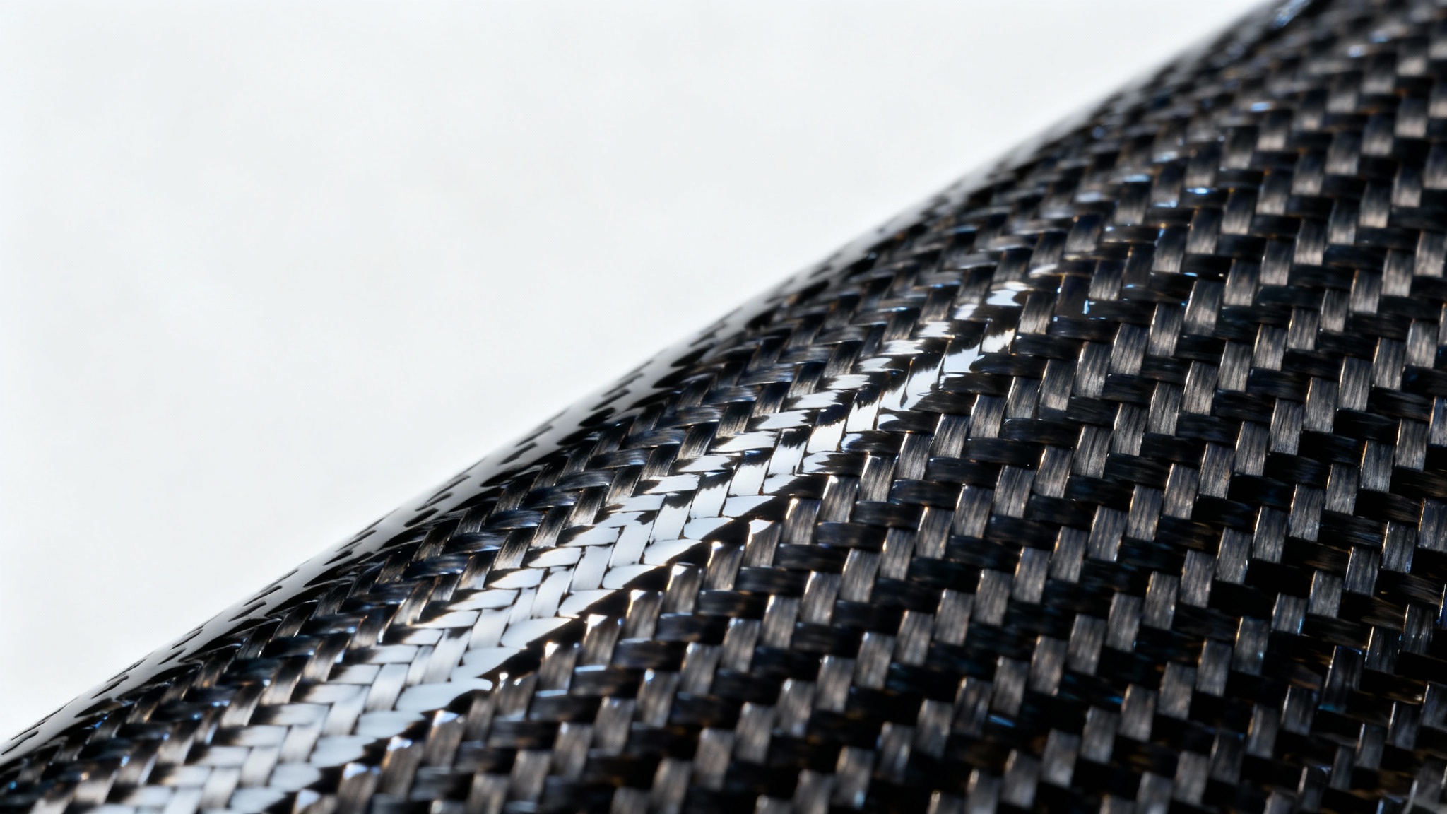 A detailed, close-up photograph of a glossy carbon fiber texture, showing the intricate twill weave pattern under dramatic lighting against a clean white background.