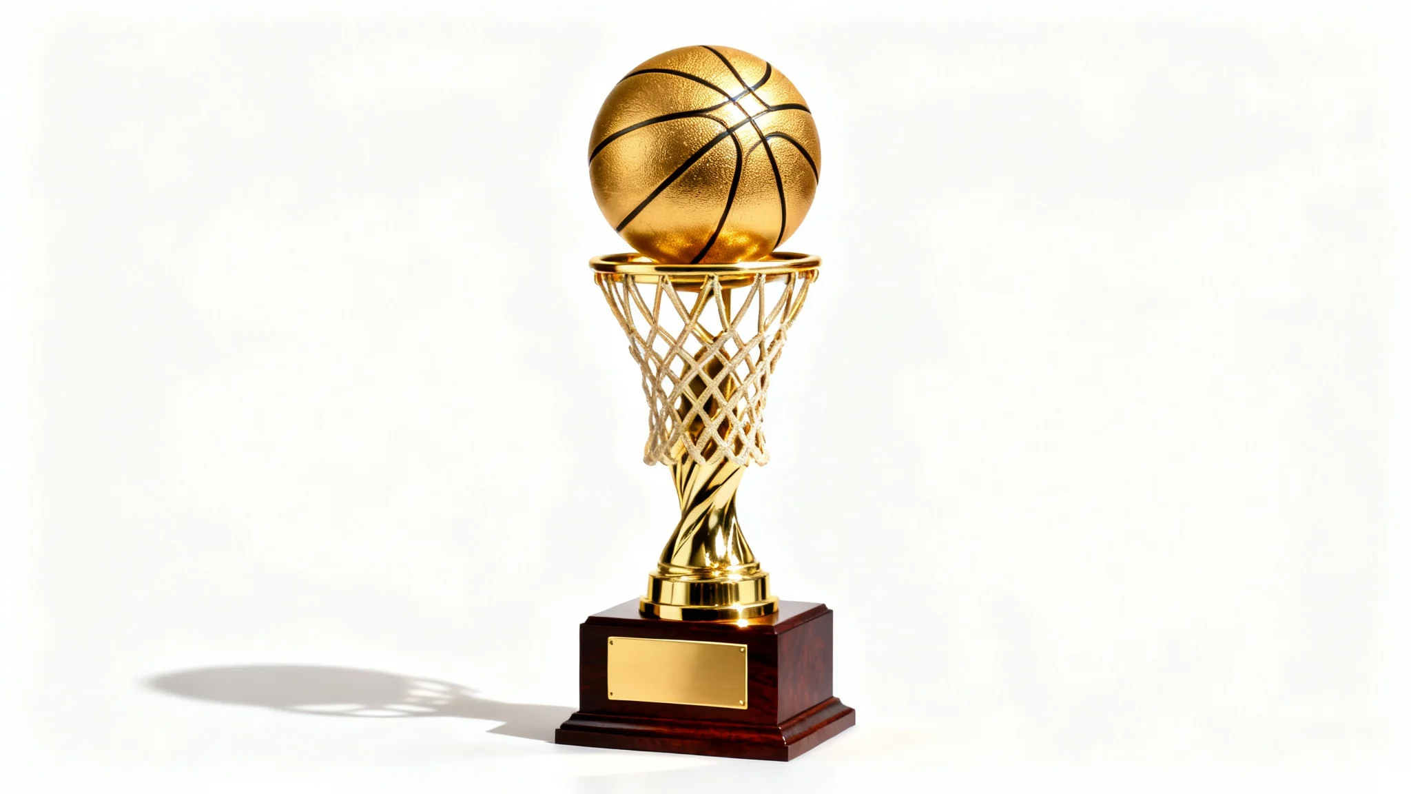 A professional studio photograph of a gleaming golden basketball trophy with a dark wood base, isolated against a pure white background.