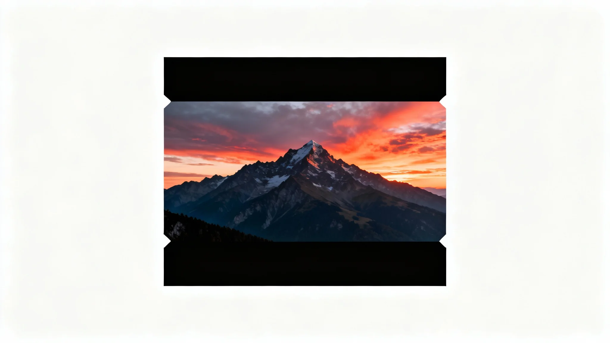 A mockup showing a beautiful mountain landscape photograph with black bars at the top and bottom, demonstrating the letterbox effect on a white background.