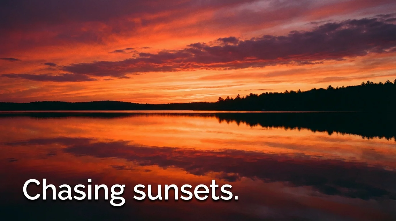 A vibrant landscape photo of a sunset over a calm lake, with an elegant white caption in the bottom corner that reads, 'Chasing sunsets.'