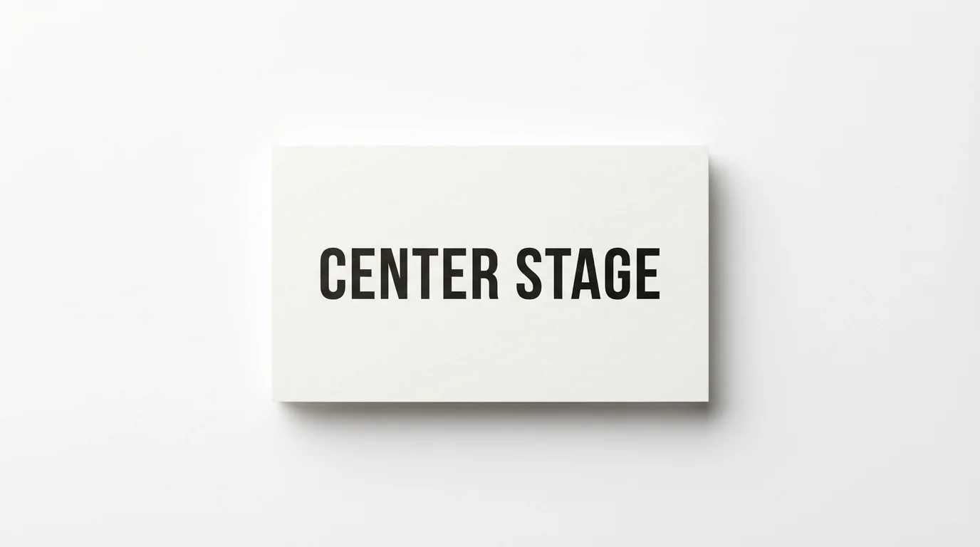 A mockup of a business card on a white background with the words 'CENTER STAGE' perfectly centered horizontally, demonstrating the text centering feature.