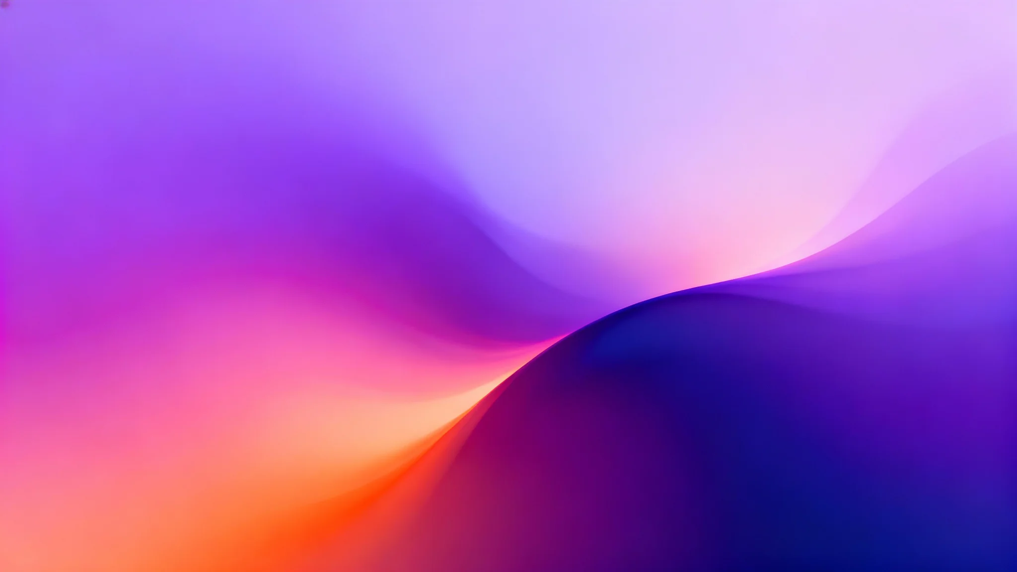 An abstract background featuring a soft, blurred gradient of purple, magenta, indigo, and orange, creating a dreamy and modern visual effect.
