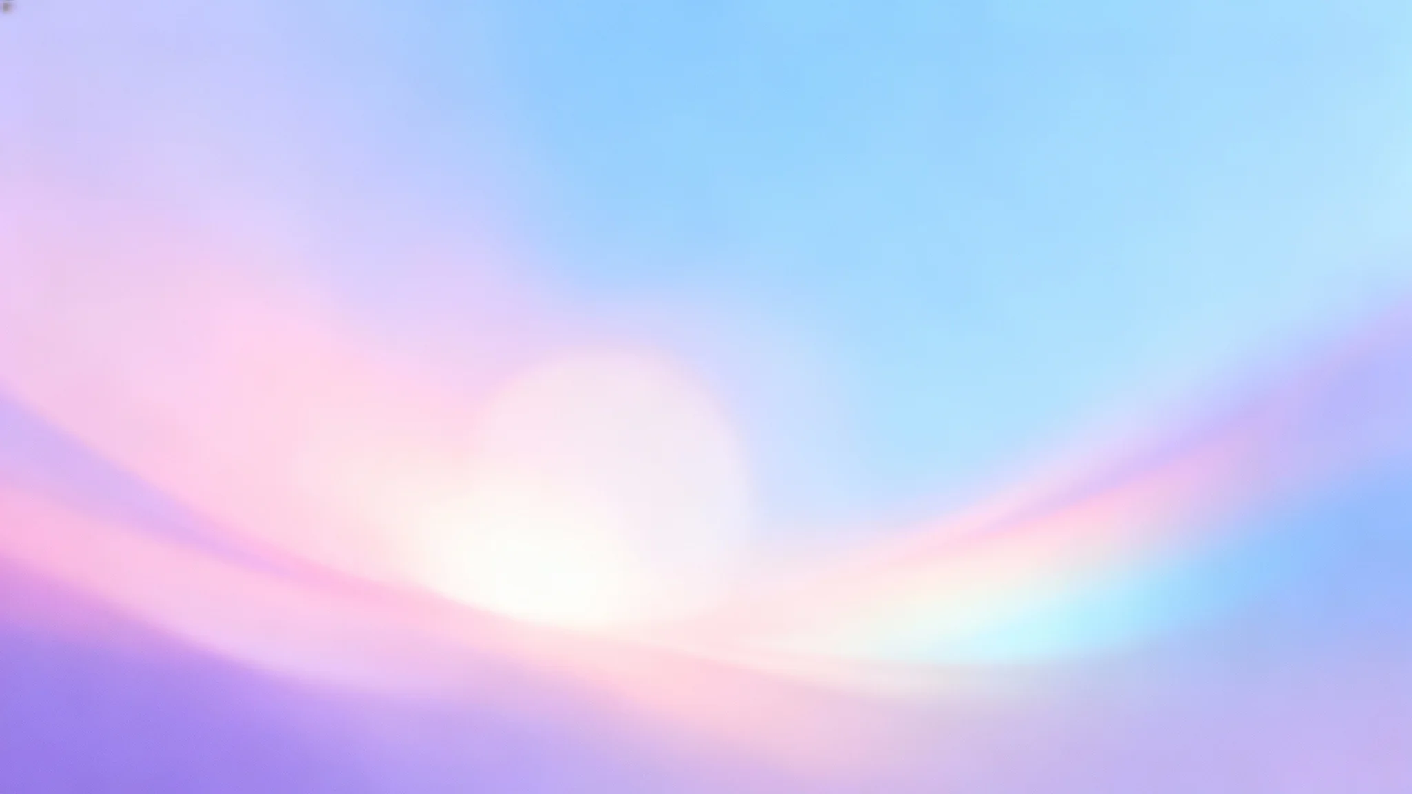 A visually pleasing blurred gradient background with soft pastel colors blending from pink to blue, creating a dreamy and modern effect.