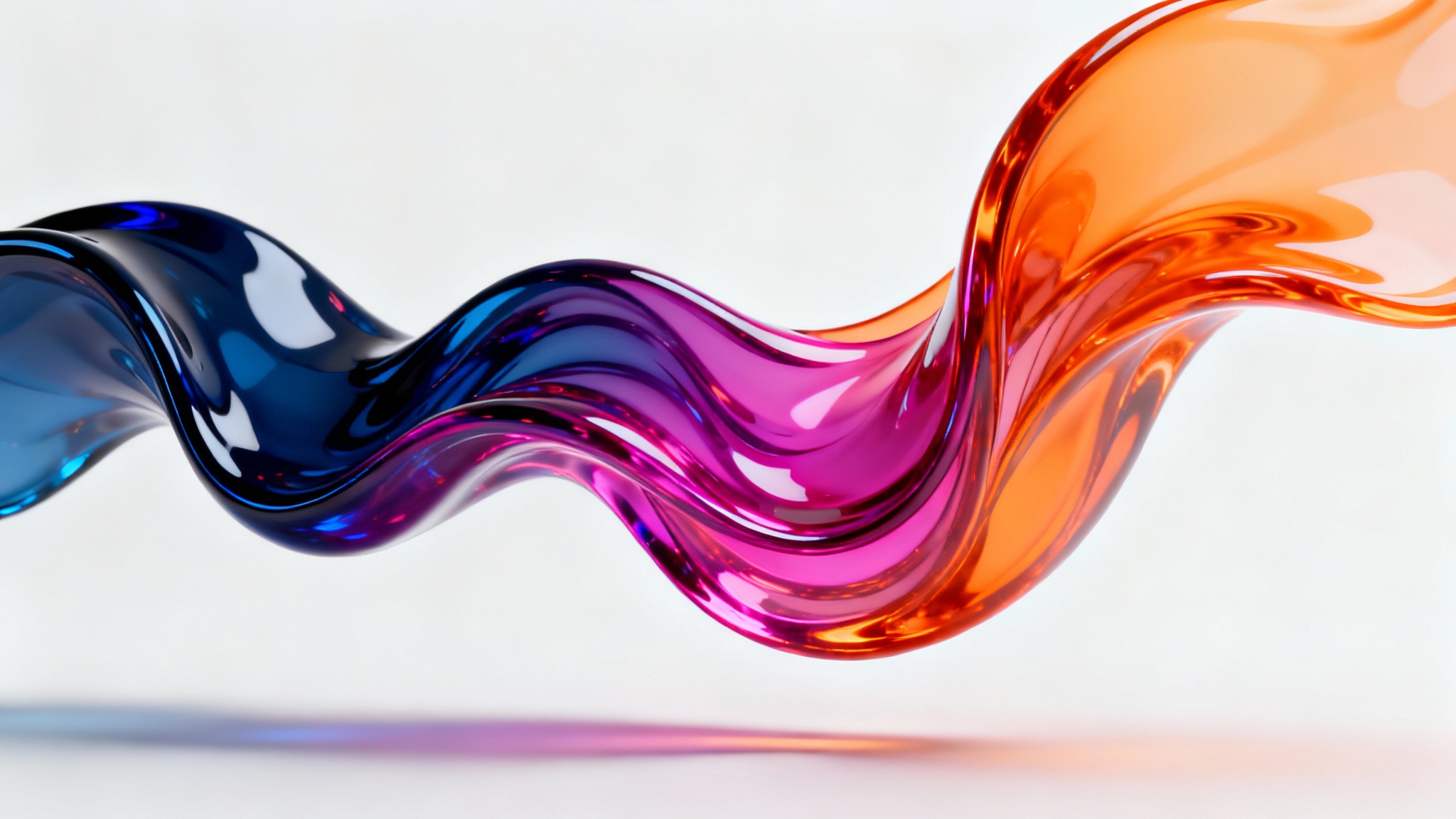 An abstract 3D sculpture demonstrating a vibrant color gradient. The smooth, flowing shape transitions from blue to magenta to orange, set against a plain white background.