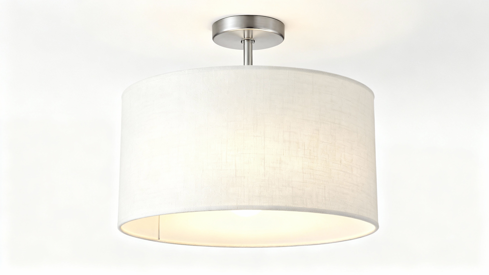 A photorealistic mockup of a modern semi-flush drum light with a textured off-white fabric shade and satin nickel hardware, shown illuminated against a plain white background.