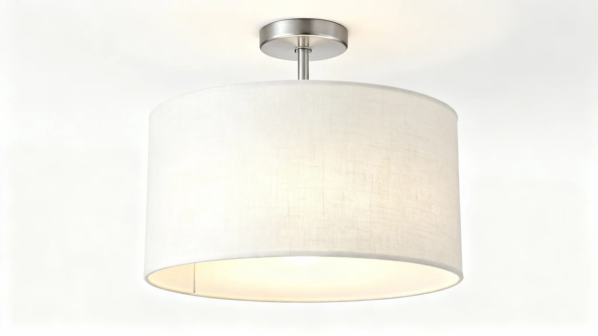 A photorealistic mockup of a modern semi-flush drum light with a textured off-white fabric shade and satin nickel hardware, shown illuminated against a plain white background.