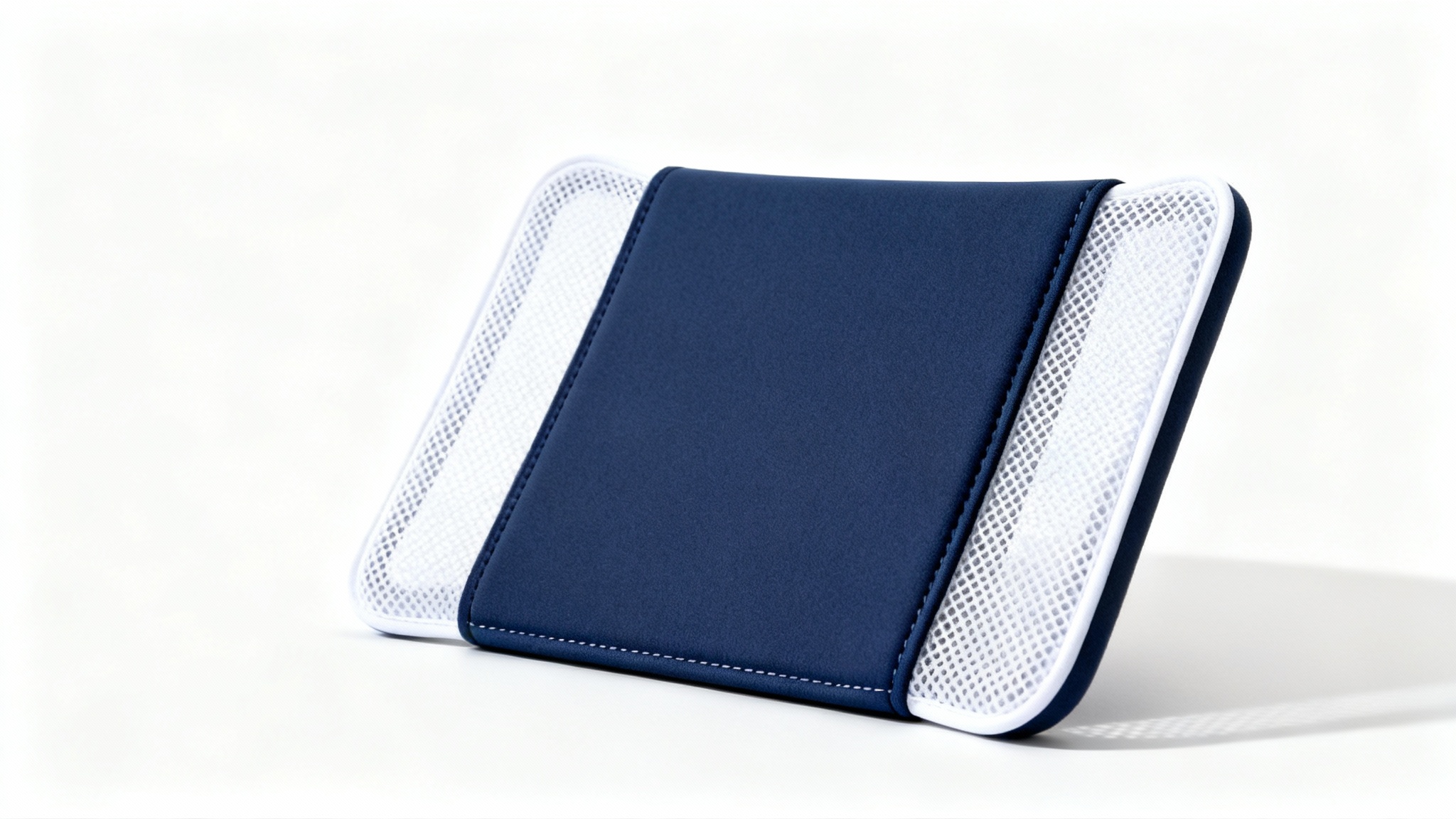 A photorealistic mockup of a navy blue and white trucker cap, angled to the side on a plain white background, ready for a custom design.