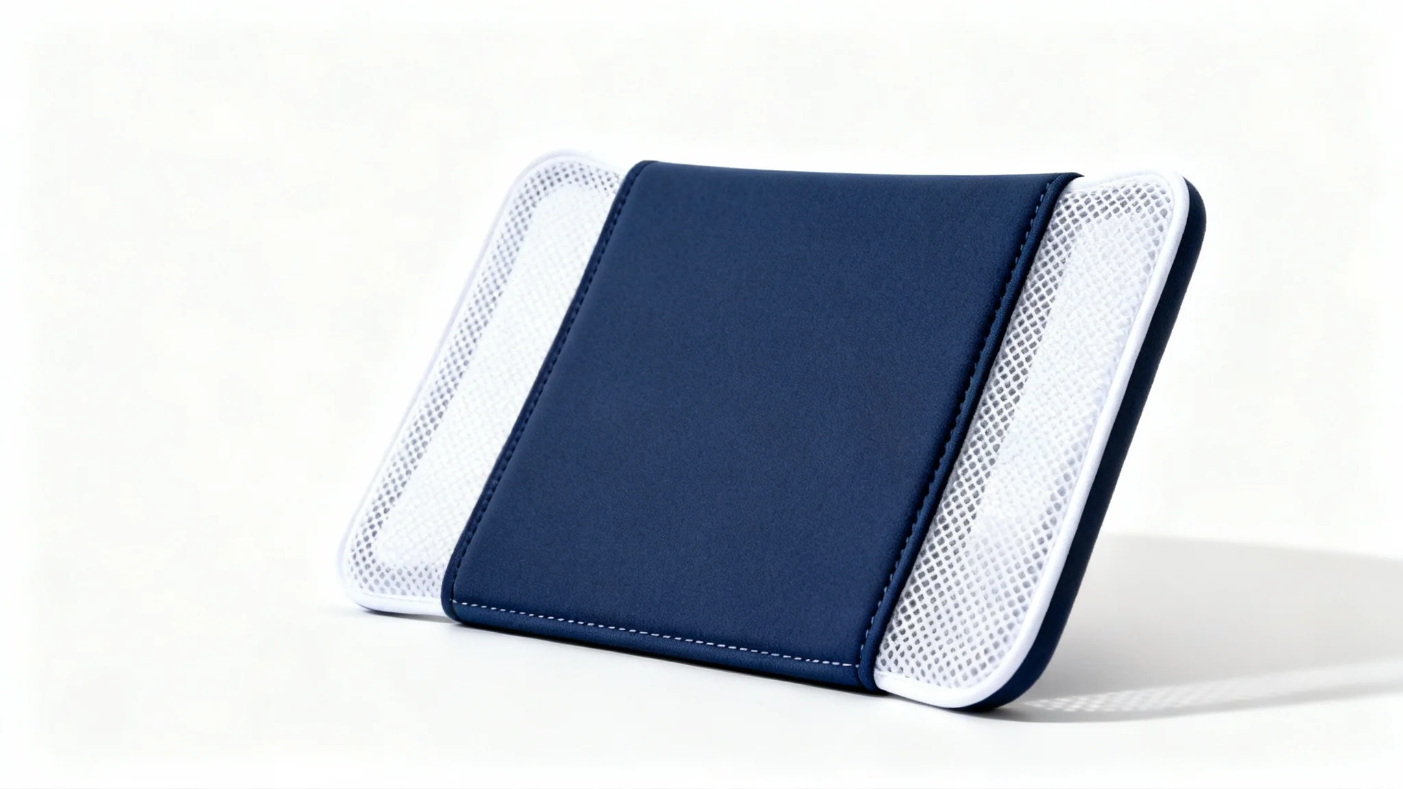 A photorealistic mockup of a navy blue and white trucker cap, angled to the side on a plain white background, ready for a custom design.