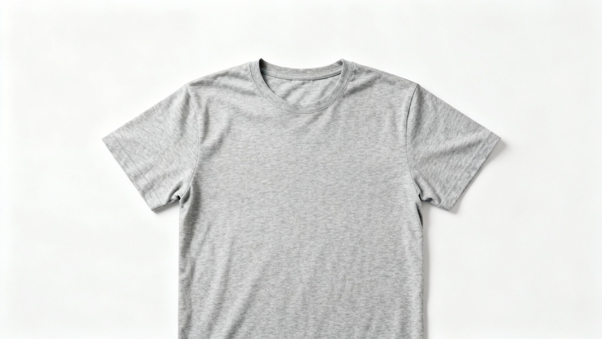 A high-quality product photo of a plain heather grey t-shirt laid flat on a pure white background, ready for a clothing mockup.