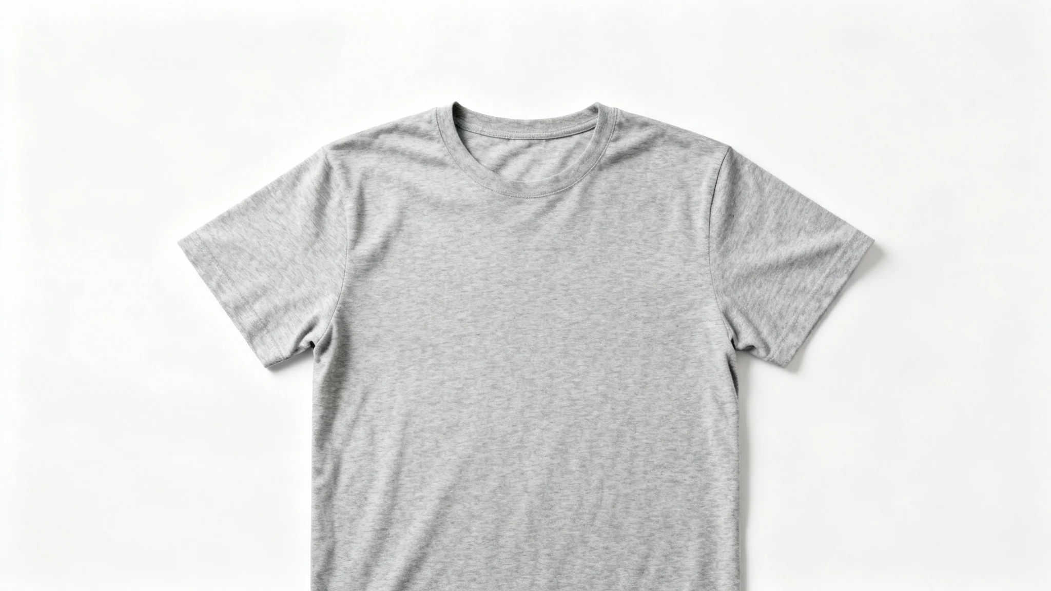A high-quality product photo of a plain heather grey t-shirt laid flat on a pure white background, ready for a clothing mockup.