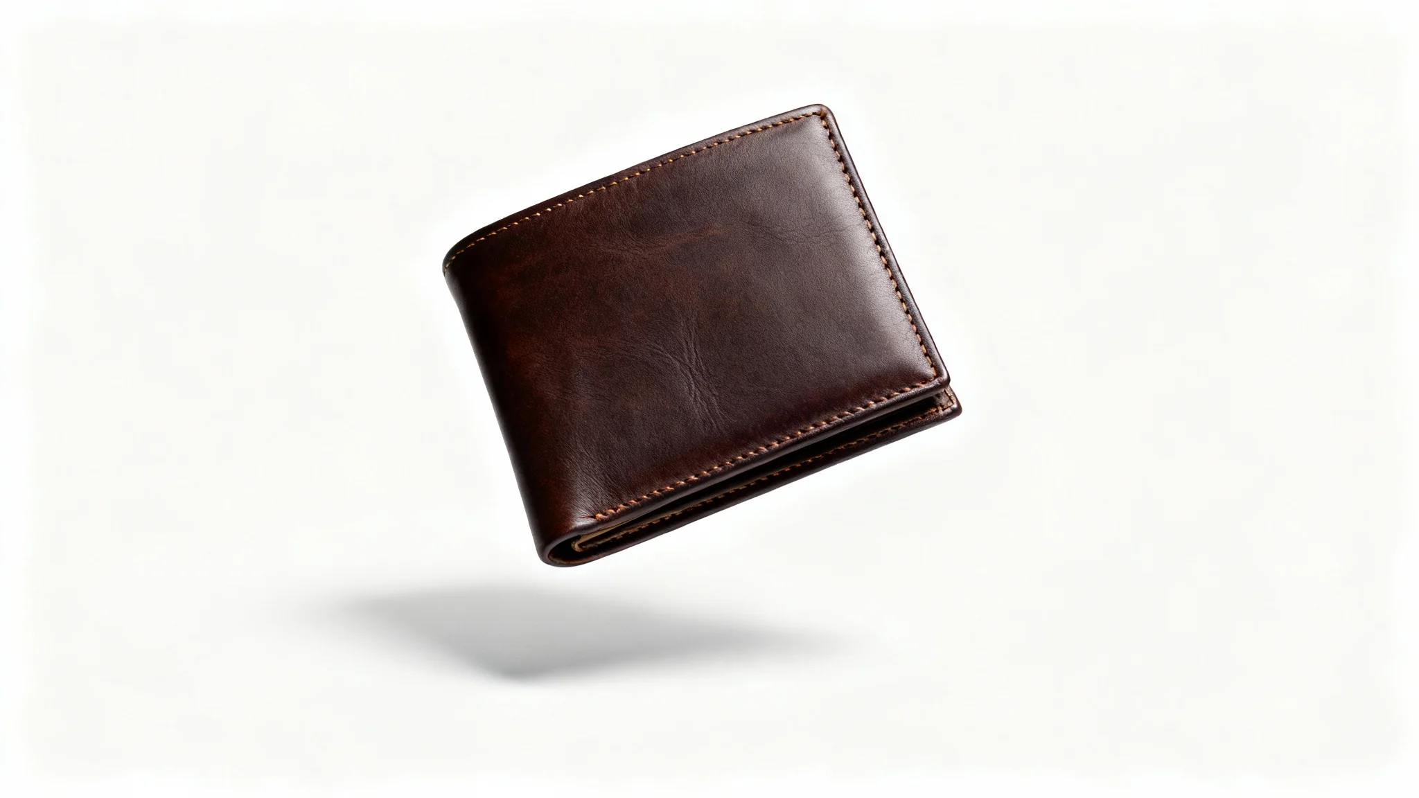 A professional product photograph of a luxurious dark brown leather wallet, elegantly displayed against a clean white background to highlight its quality and craftsmanship.