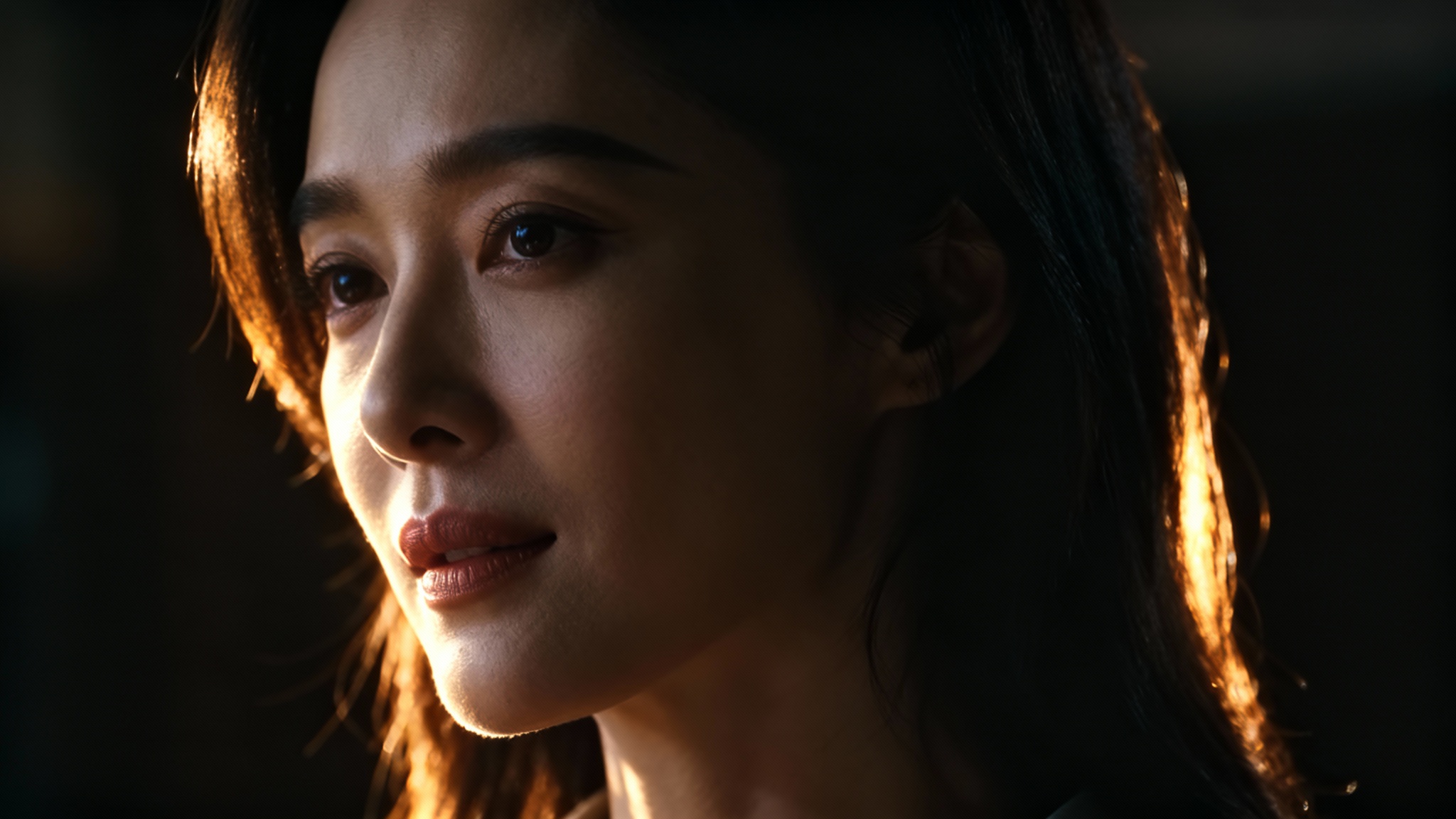 A stunning hero image demonstrating a photo relighting effect, showing a woman's face dramatically lit from the side against a dark background.