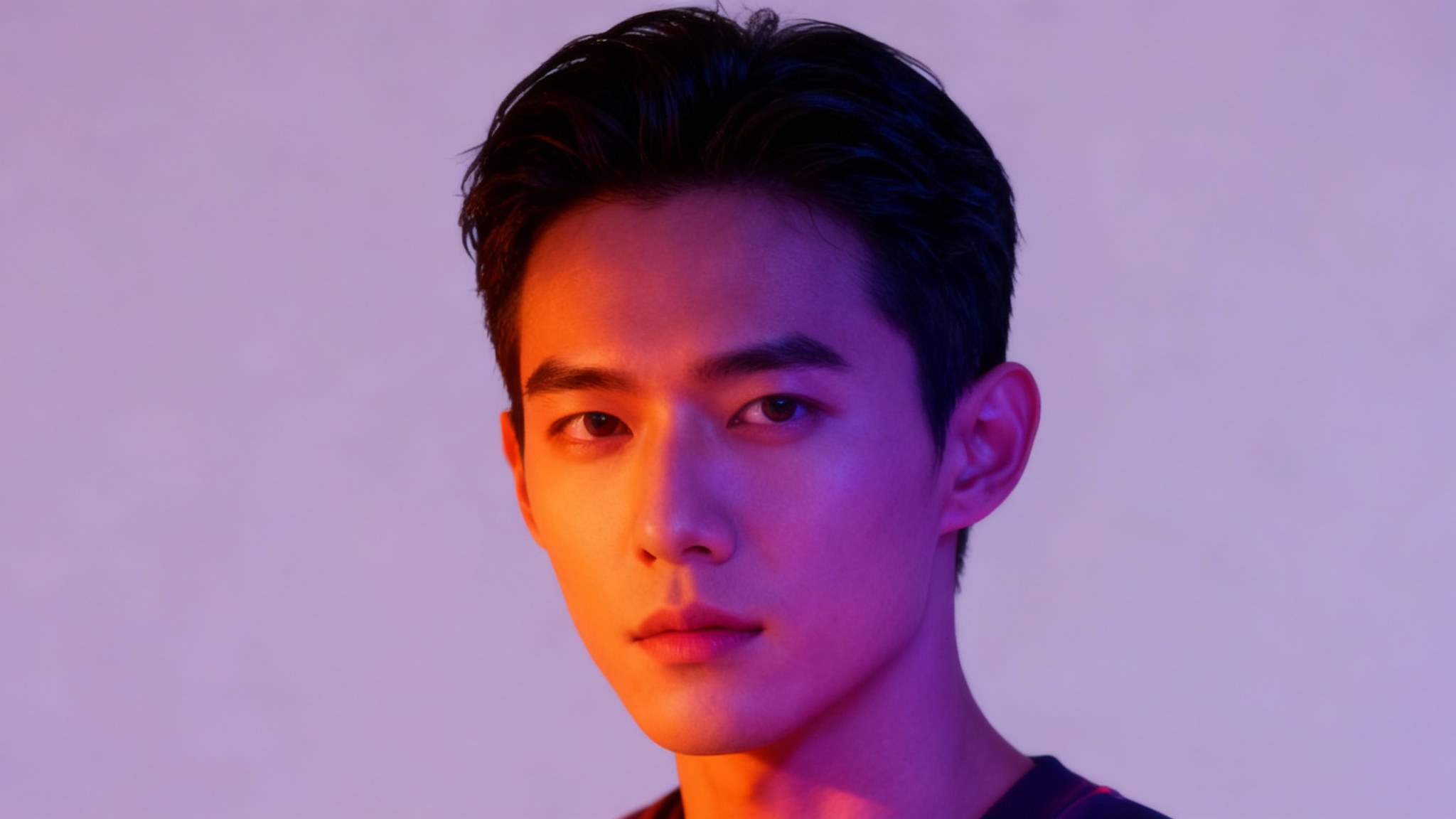 A hero image demonstrating a gradient map effect. A portrait of a person is recolored with a vibrant gradient, showing deep blue shadows, magenta midtones, and bright orange highlights.