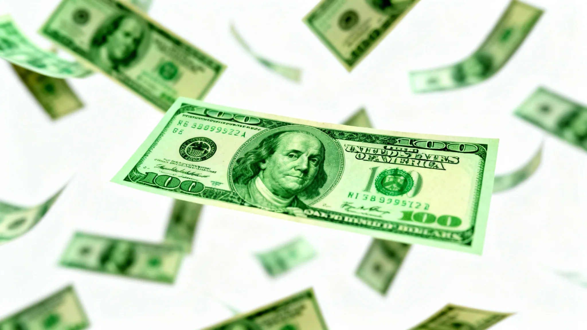 An exciting, high-resolution image of hundred-dollar bills raining down against a clean white background, symbolizing wealth and success.