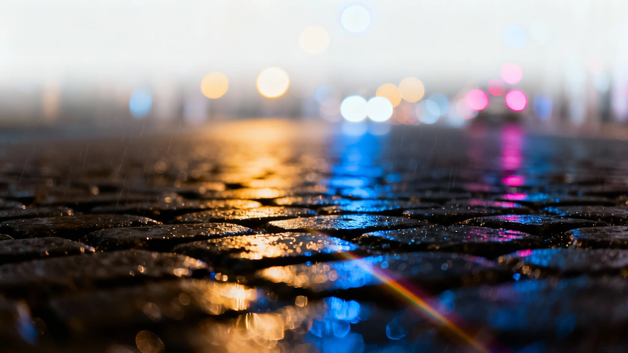 A photorealistic image demonstrating a lens effect, with a sharp focus on a wet cobblestone street and a beautifully blurred background of colorful city lights creating a strong bokeh effect.