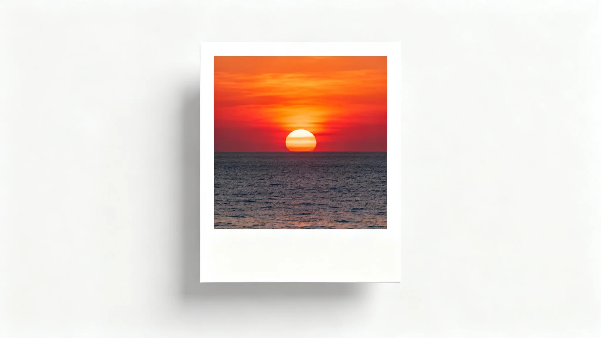 A mockup of an Instagram post showing a beautiful sunset photo framed by a thick white border, set against a plain white background.
