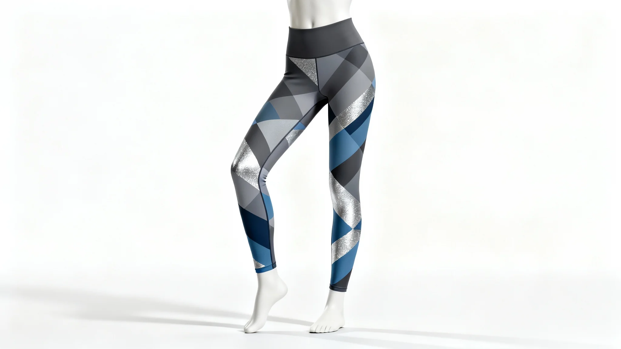A photorealistic mockup fatores a pair of high-waisted women's leggings with a gray and blue geometric pattern, displayed on a figure against a stark white background.